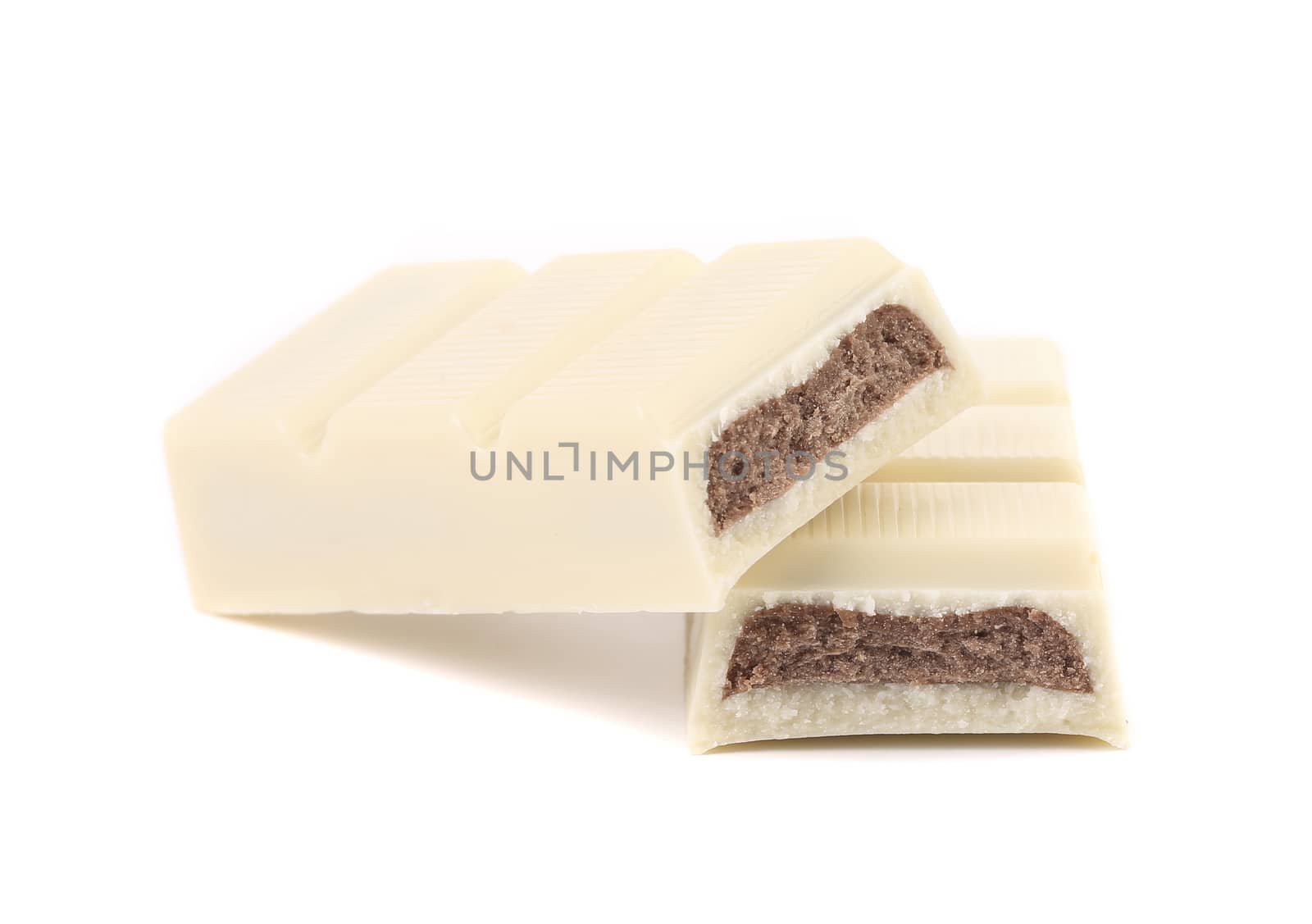 White chocolate bar with filling. White background
