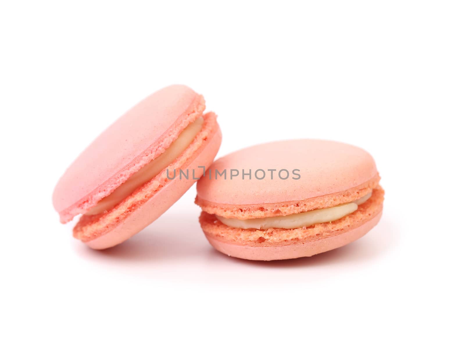 Two pink macaron cakes. Isolated on a white background.