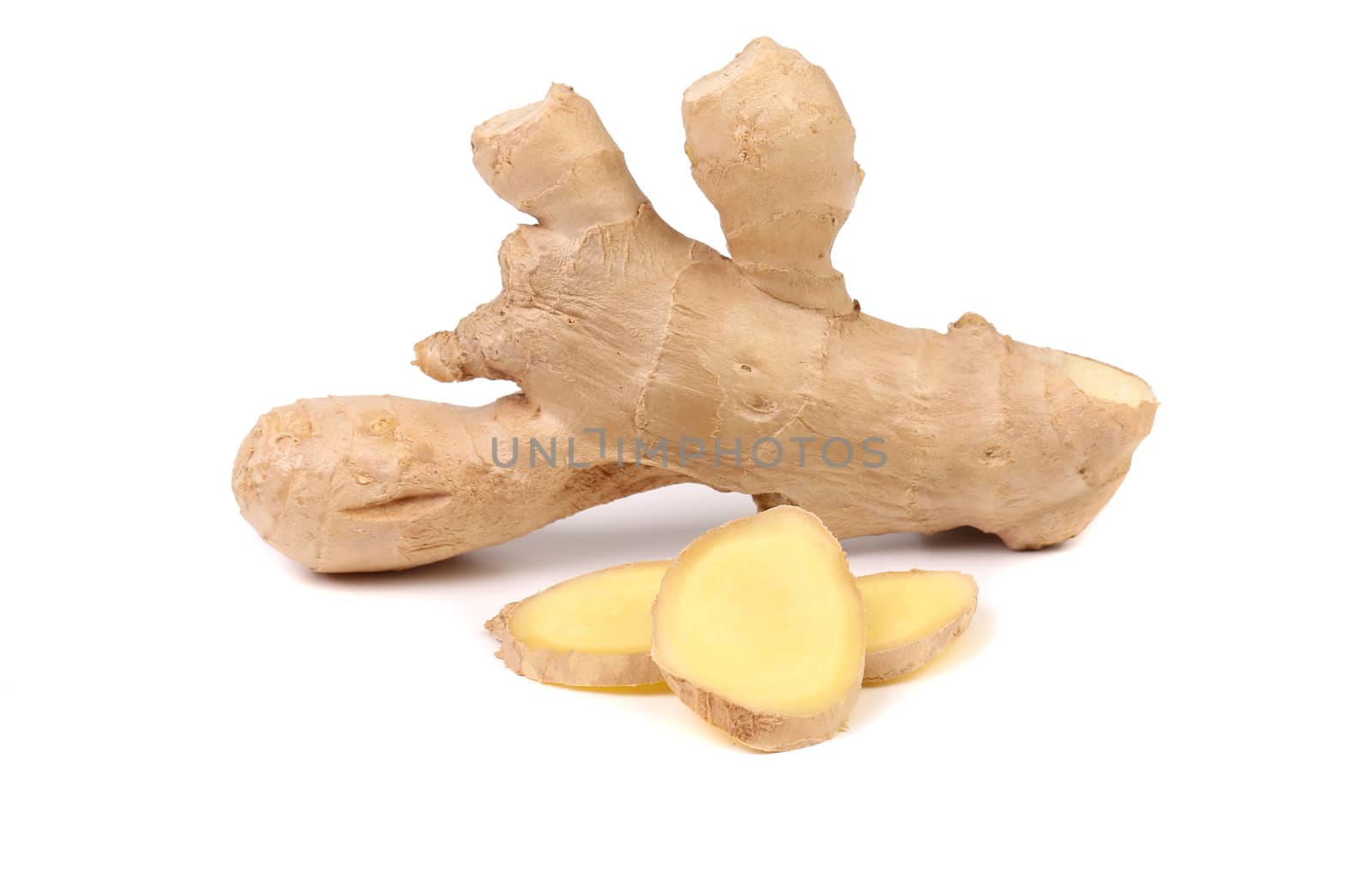 Fresh ginger and slices. Isolated on a white background.