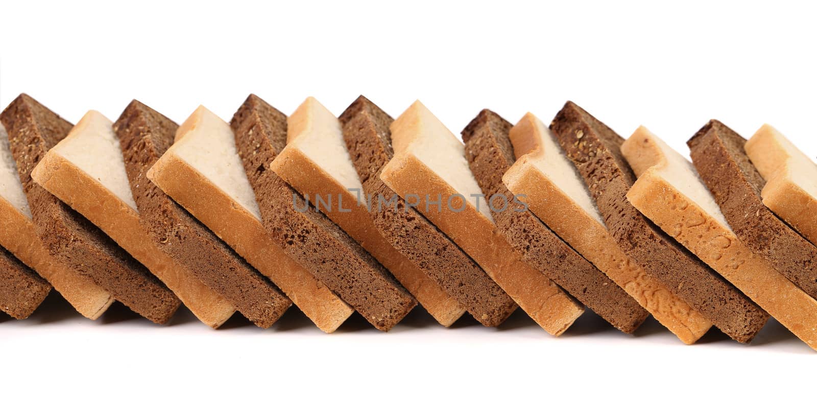 Row of sliced bread. White and black. Isolated on a white background.