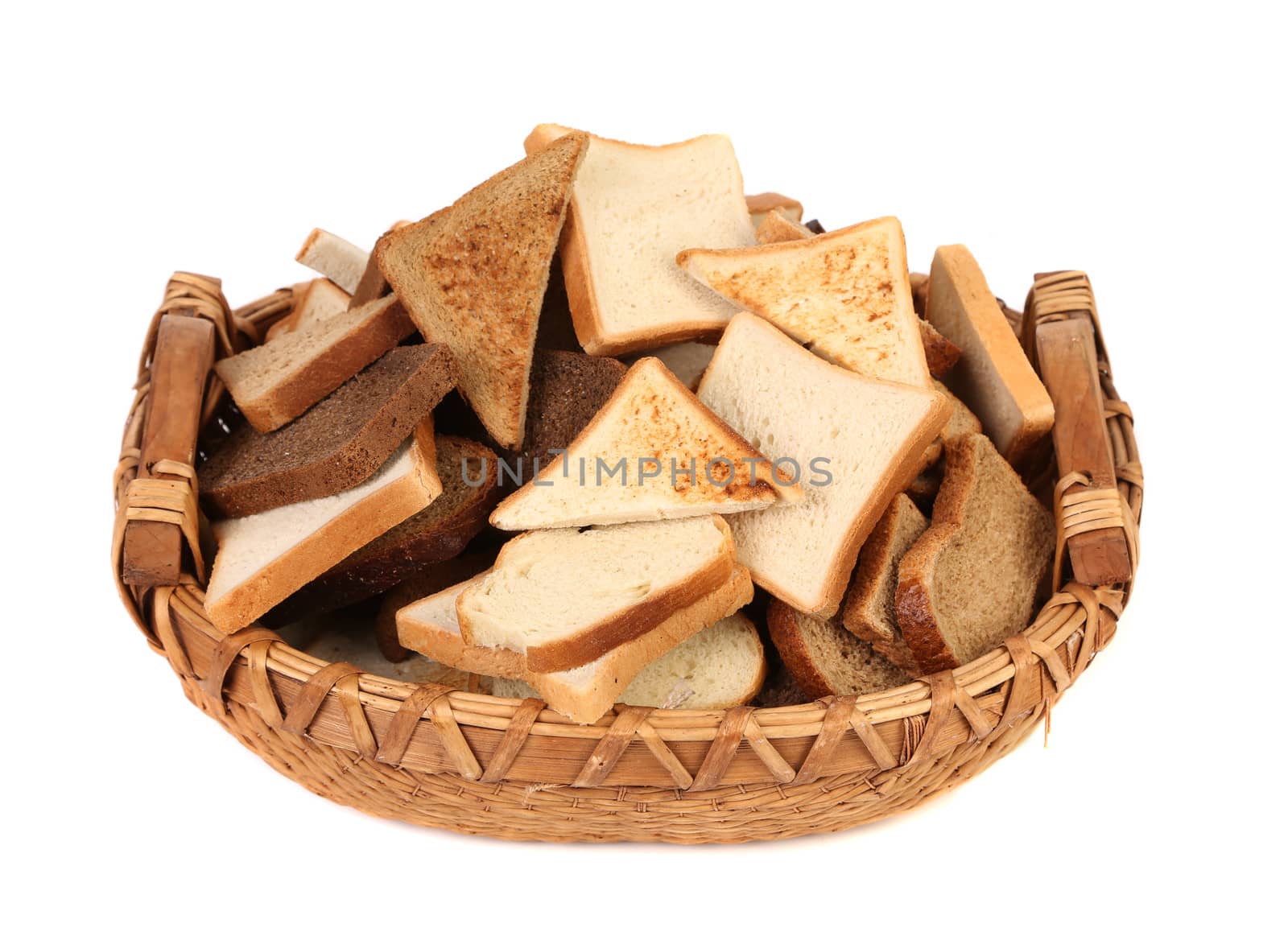 Full basket of different sliced bread. Isolated on a white background.