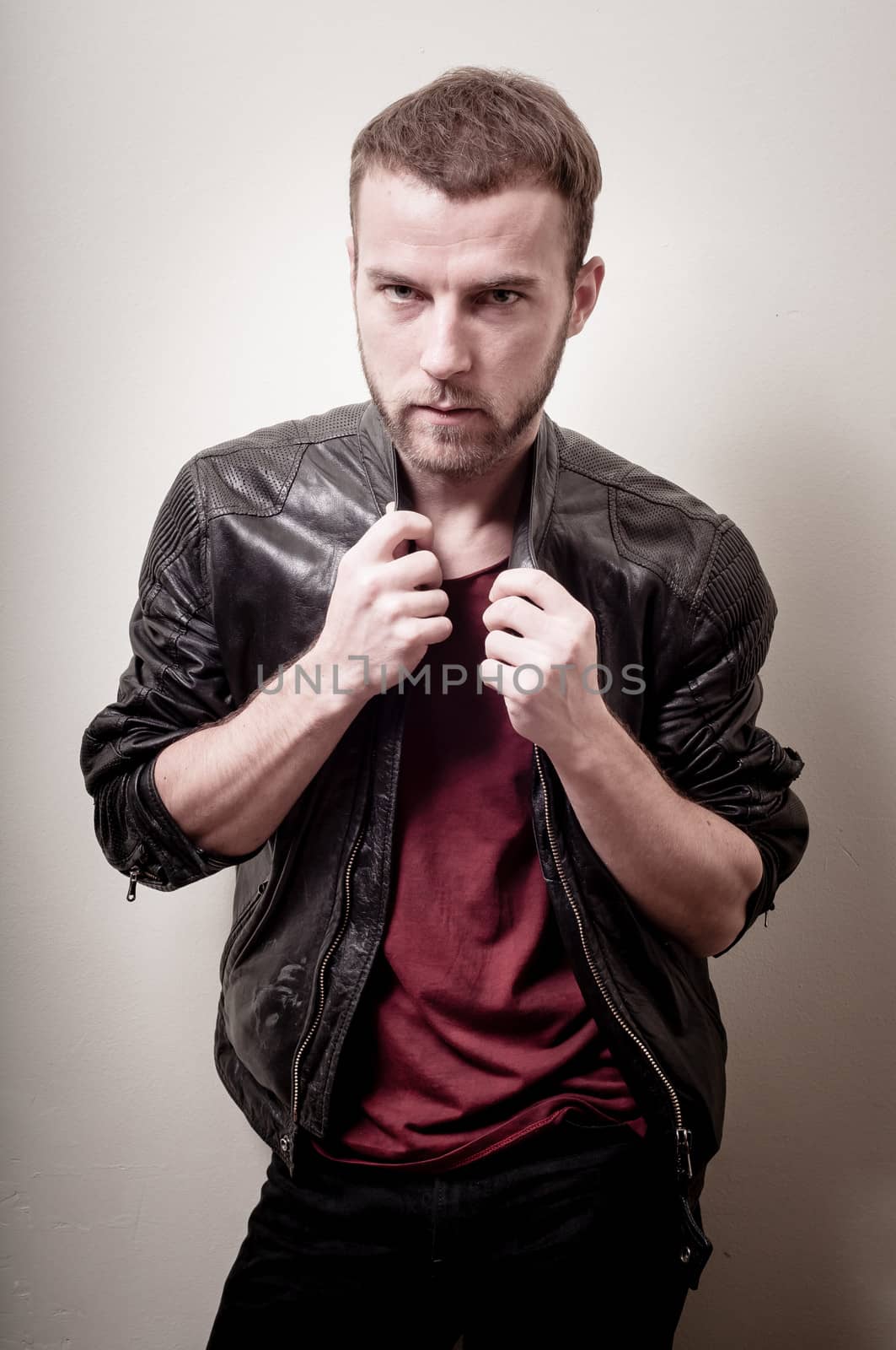 stylish hipster man portrait on gray background