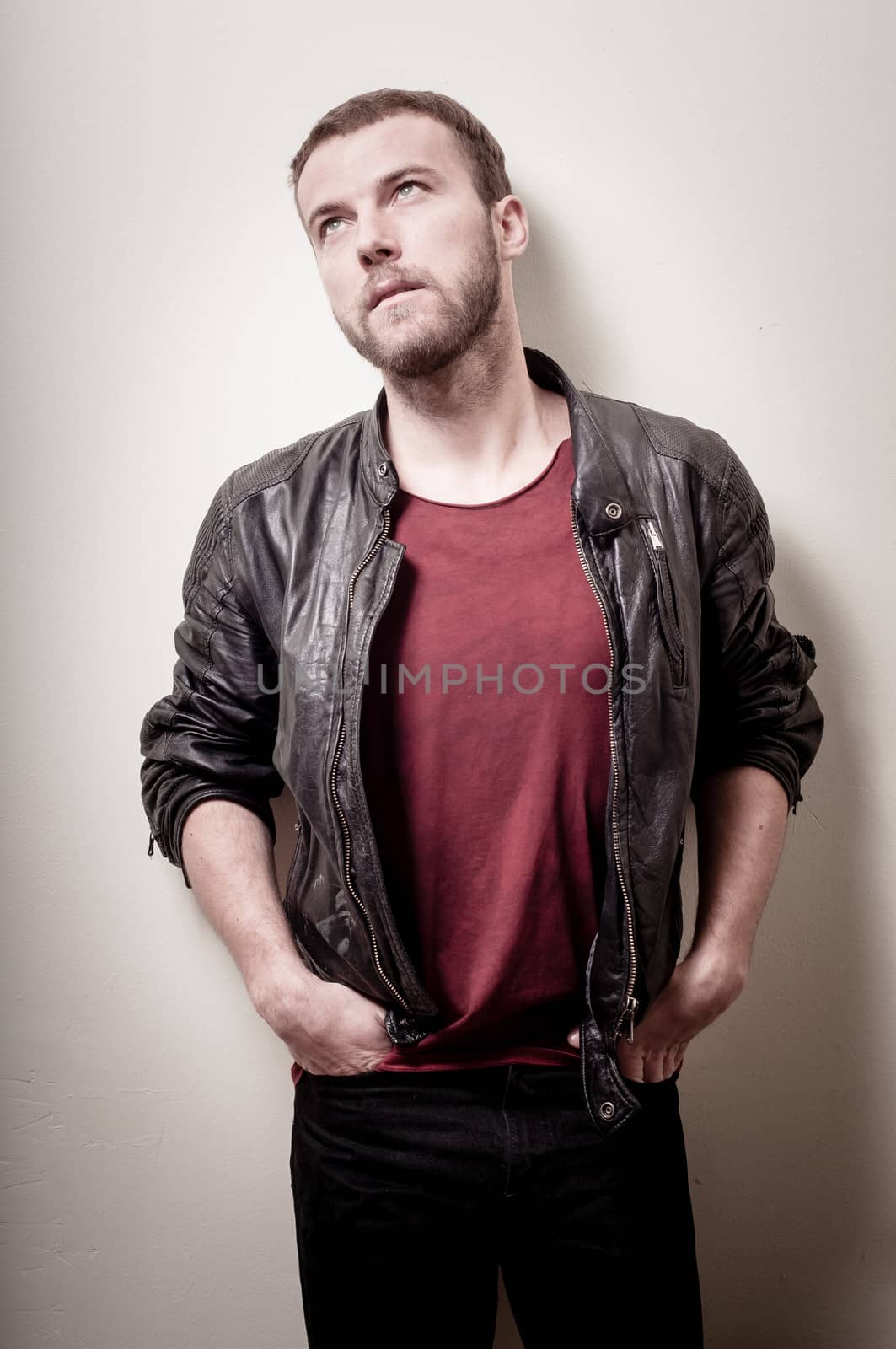 stylish hipster man portrait on gray background