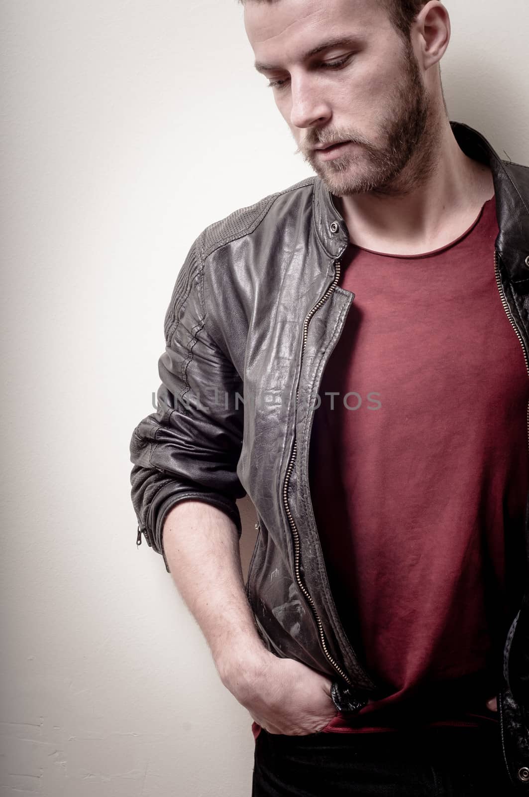 stylish hipster man portrait on gray background