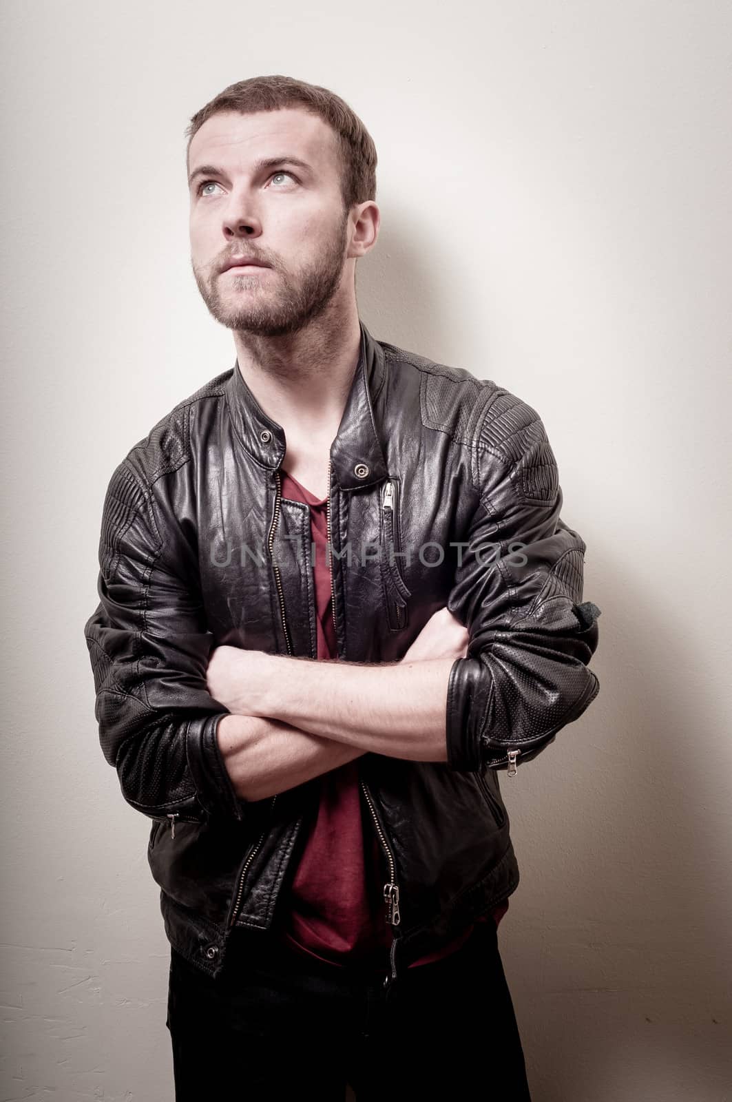 stylish hipster man portrait on gray background