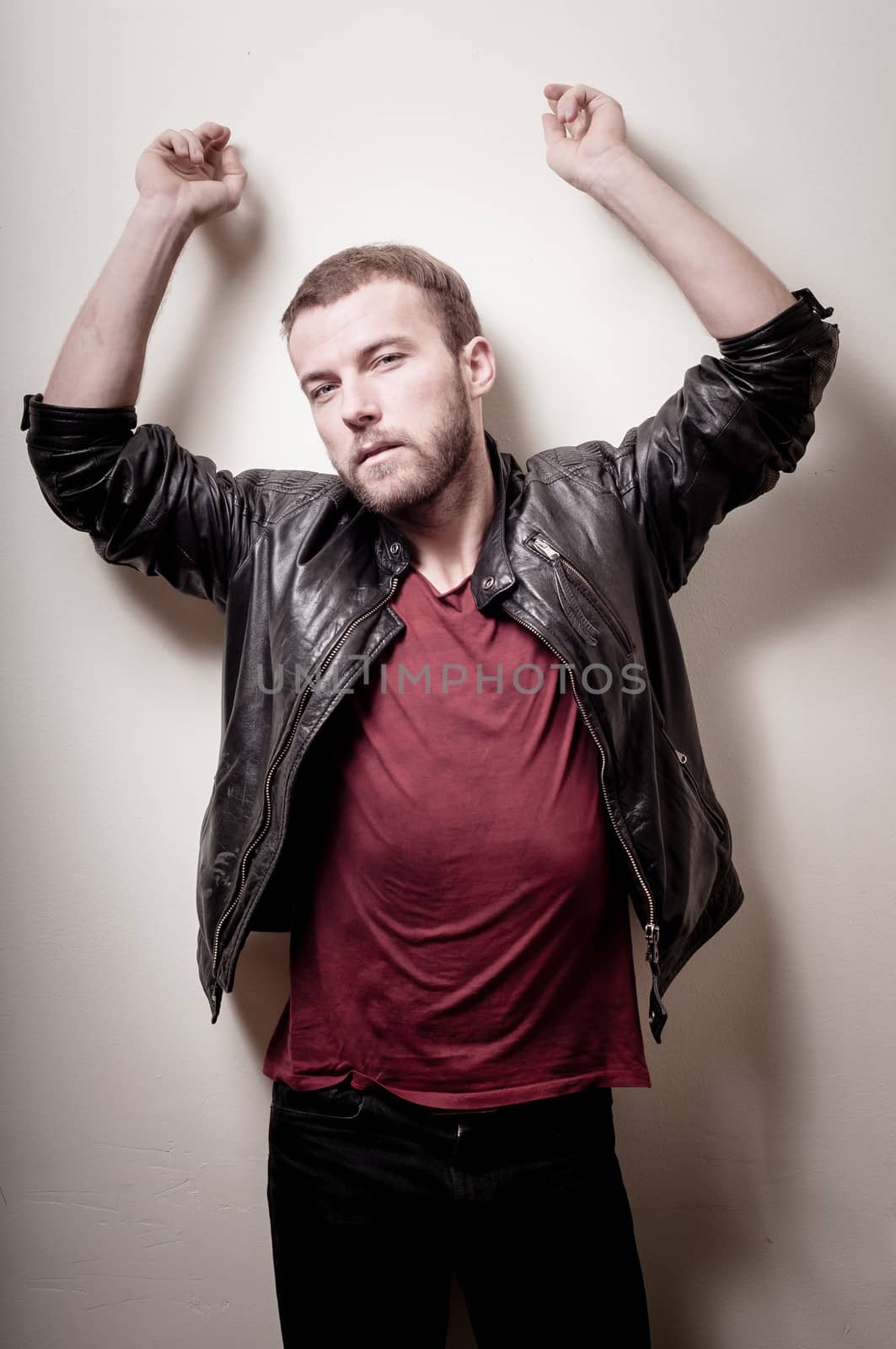 stylish hipster man portrait on gray background