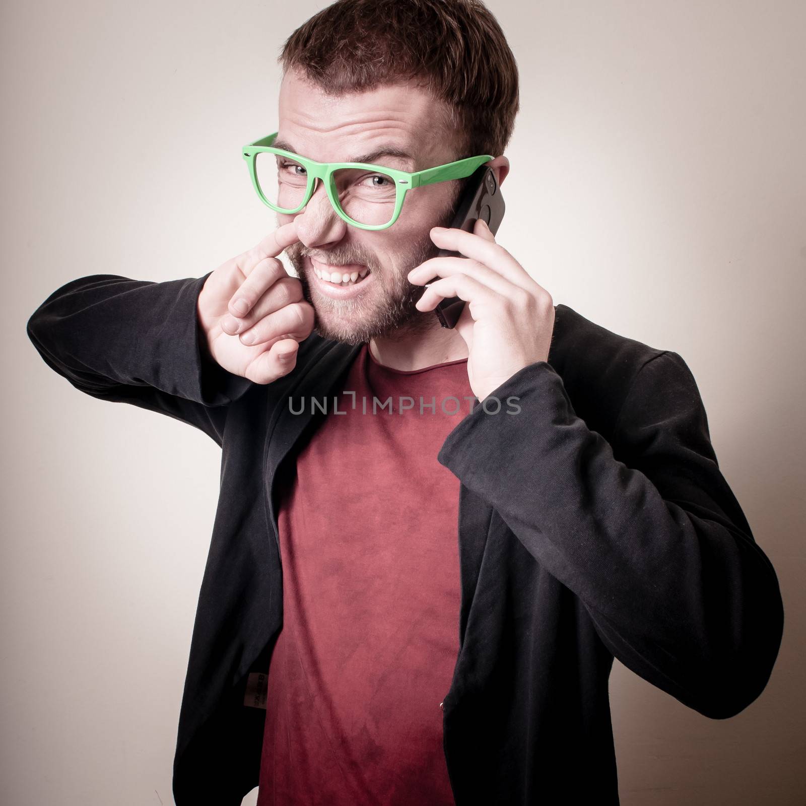 funny stylish hipster man on the phone by peus