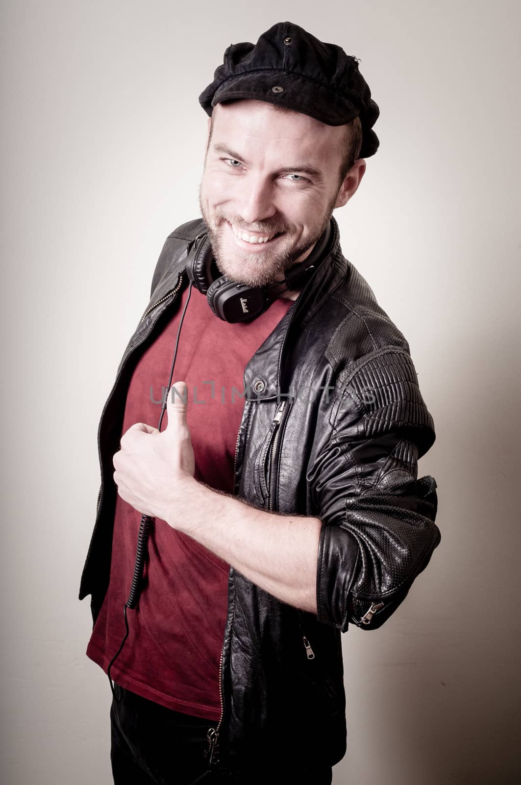 stylish hipster man portrait on gray background