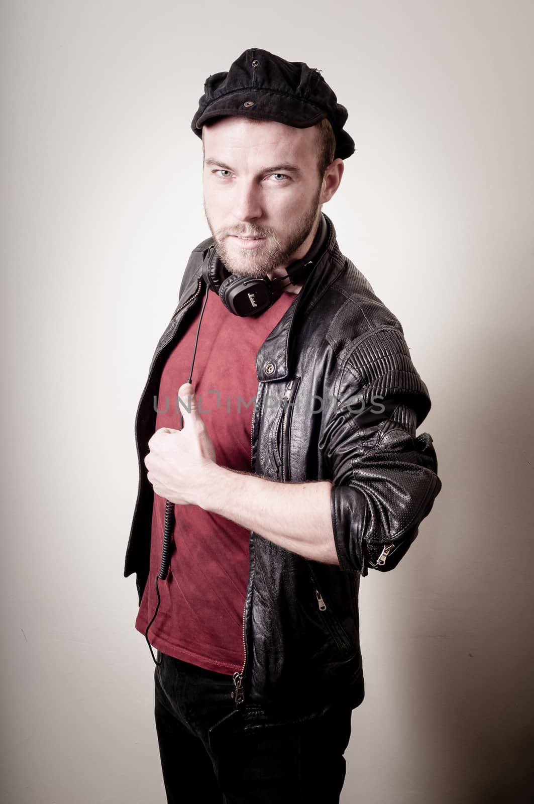 stylish hipster man portrait on gray background