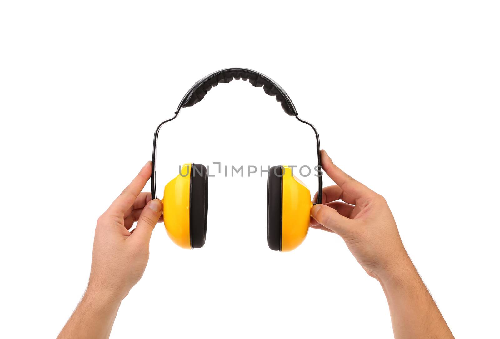 Hands holds working protective headphones. Isolated on a white background.