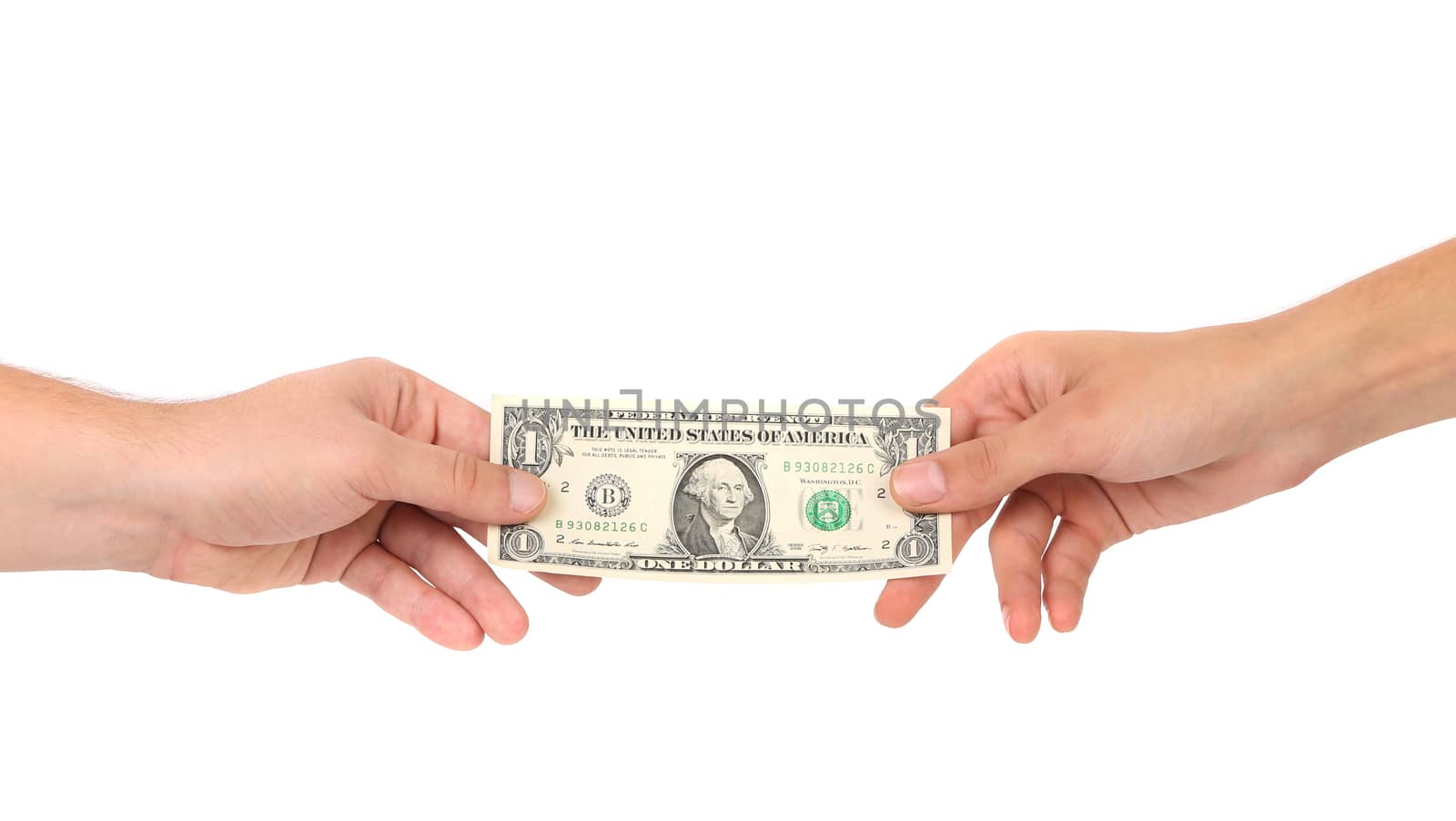 The transfer of money from hand to hands. Isolated on a white background.