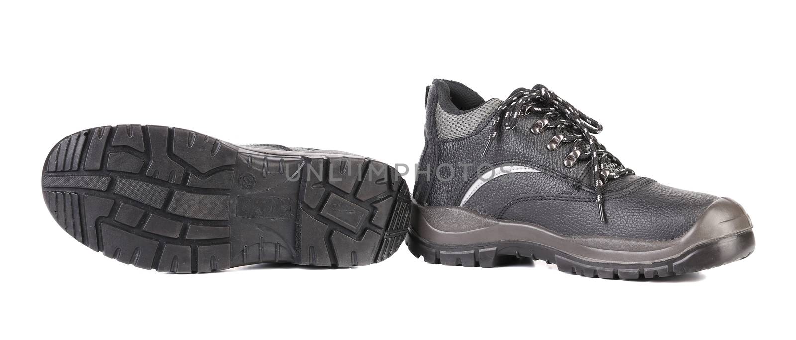 Working boots of black color. Isolated on white background.