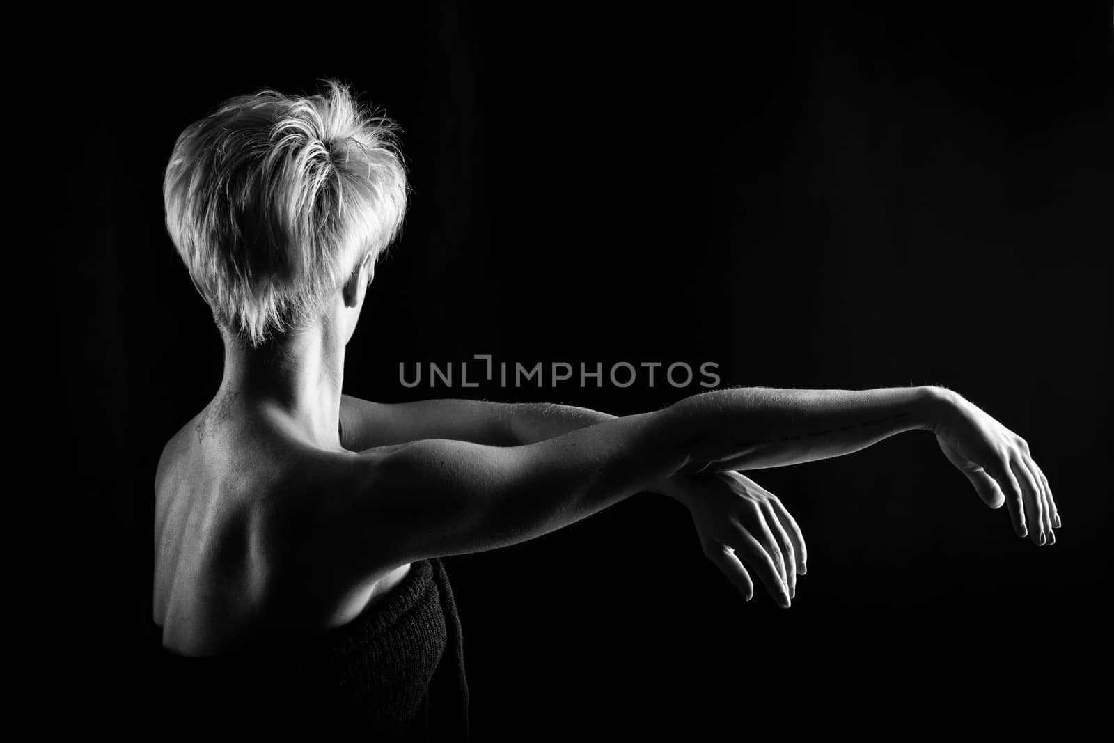 Attractive girl dancing, shot in black and white version