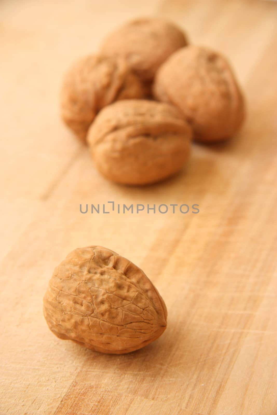 Walnuts on wooden table