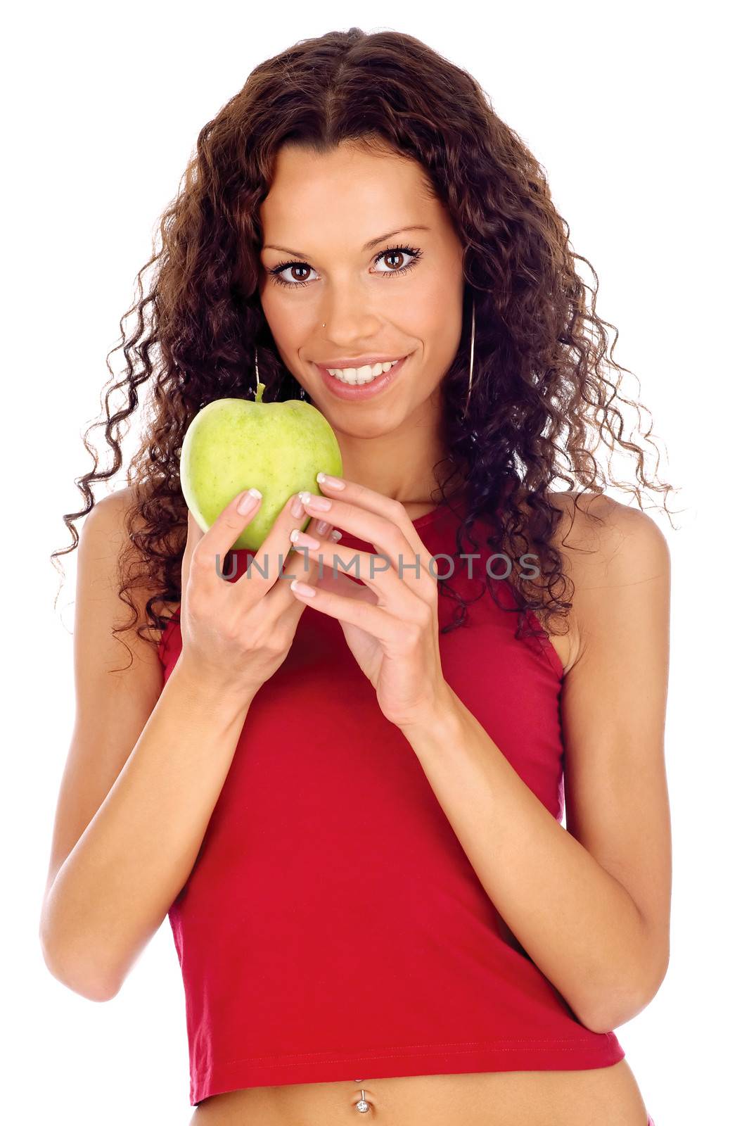 Curl hair brunette woman holding greeen apple, isolated