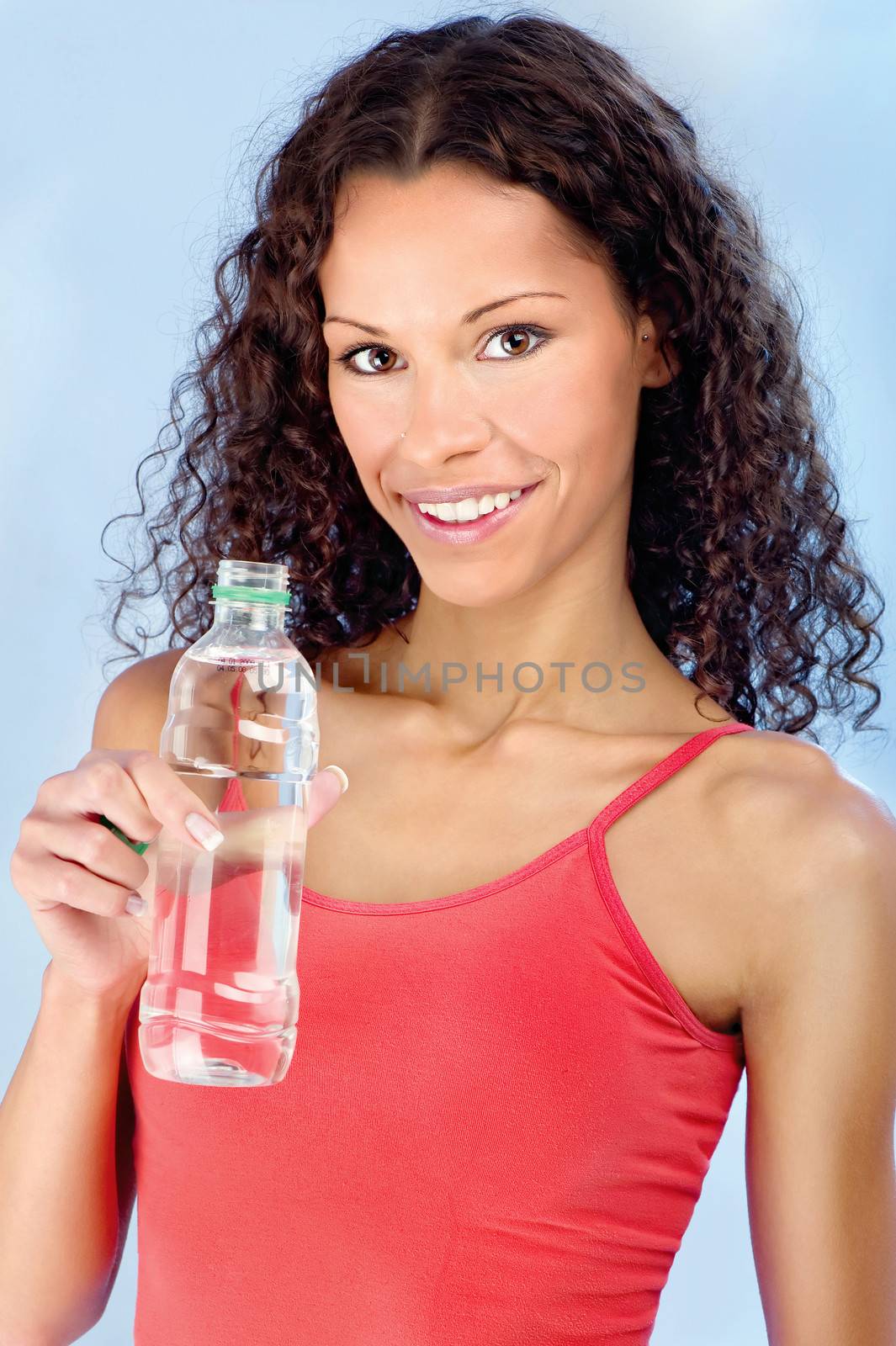 Happy woman and bottle of water by imarin