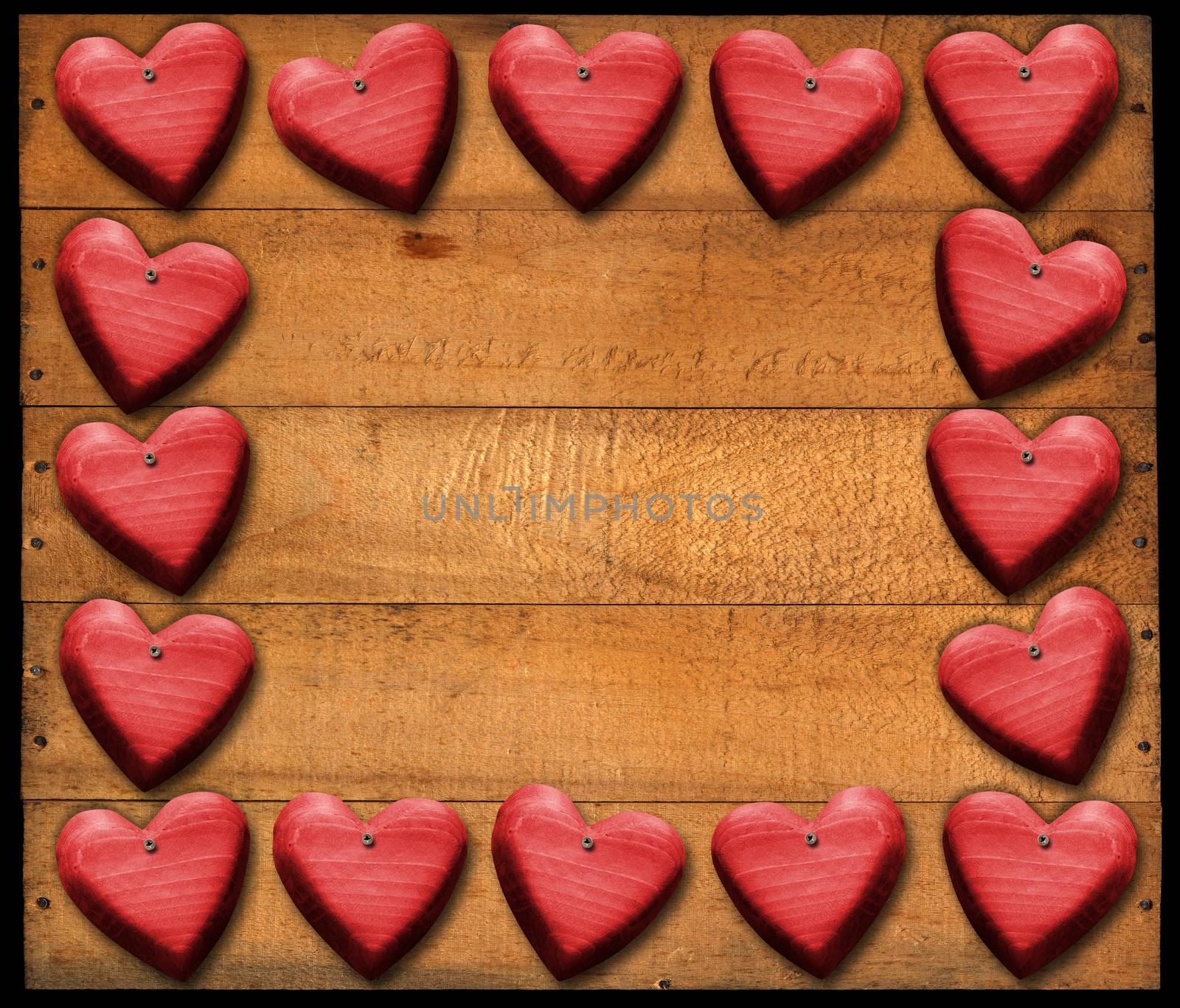 Many wooden red hearts on wooden damaged boards with nails