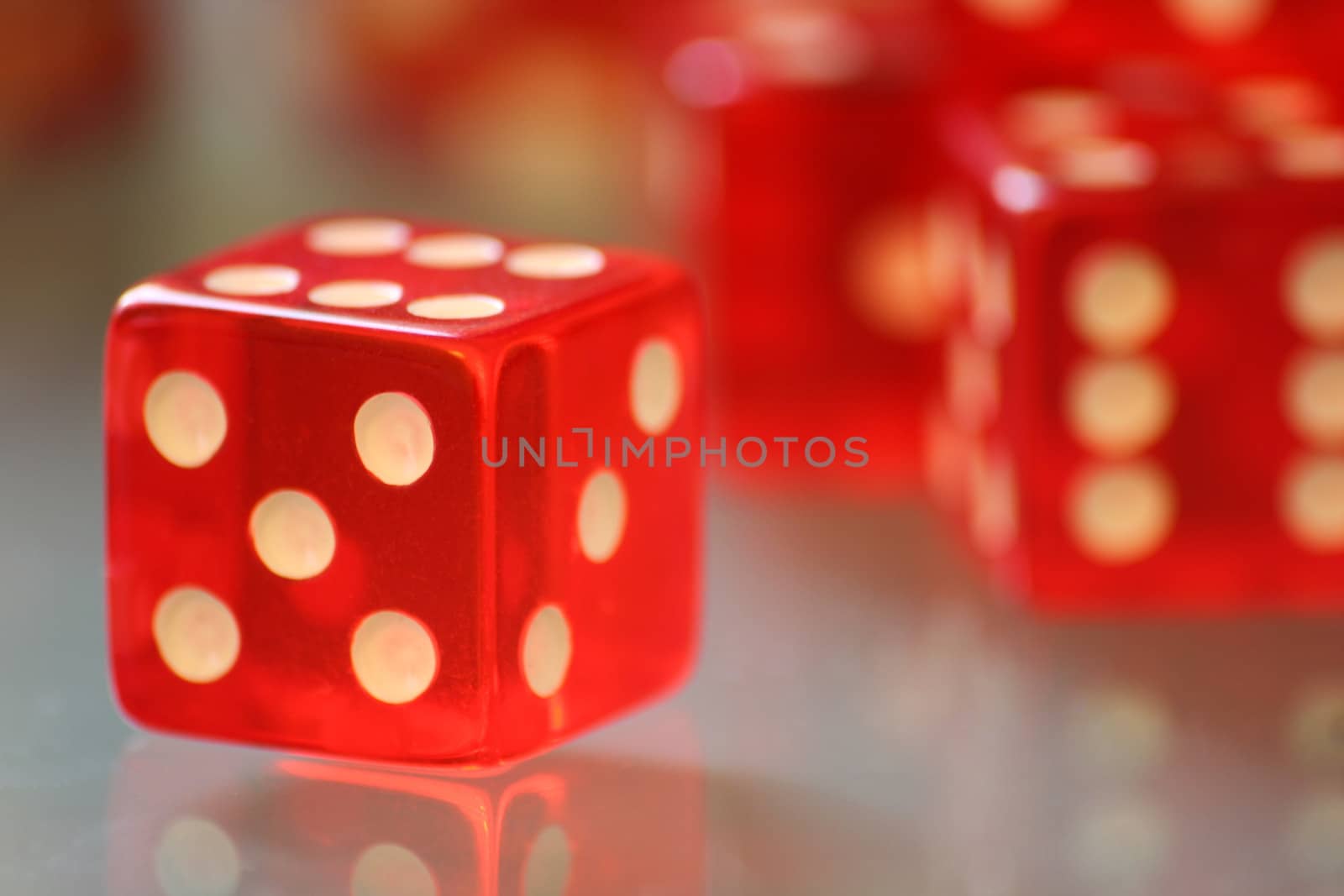 Red dice with reflection