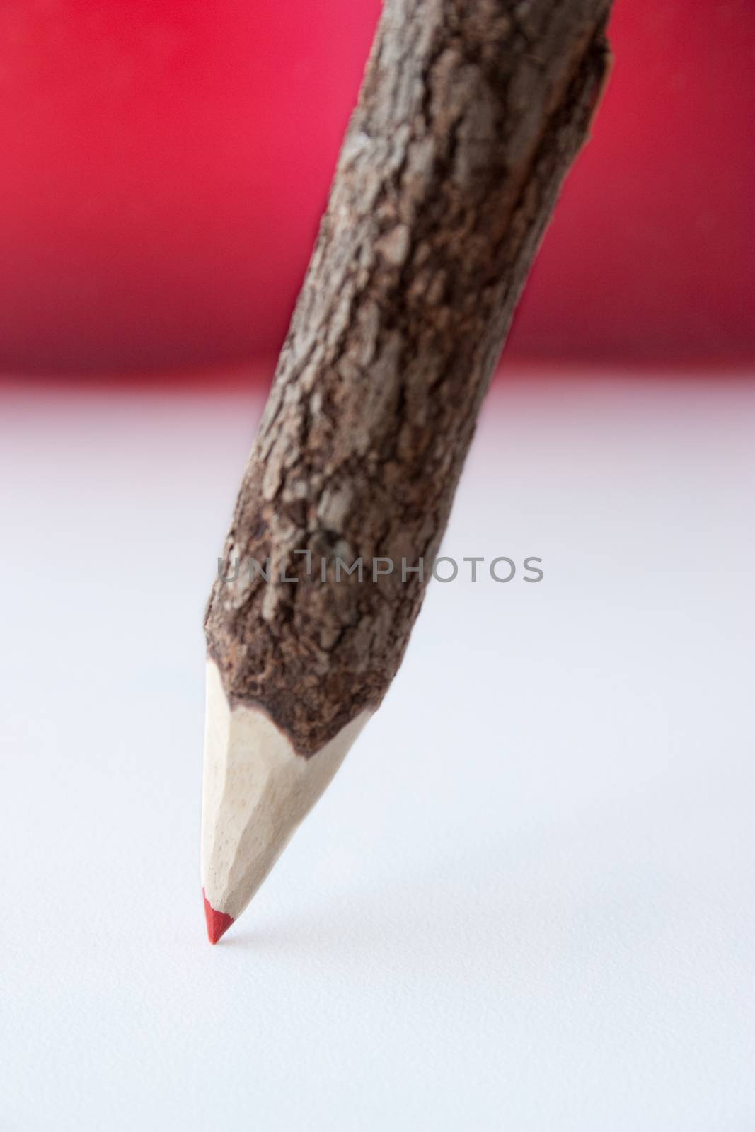 Red pencil red and white background by evdayan