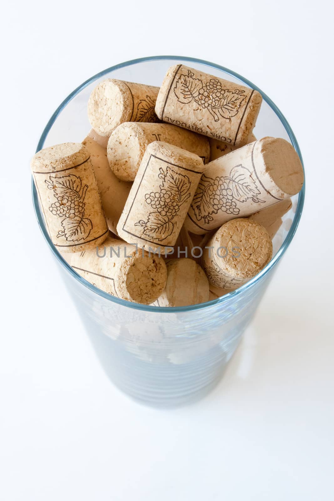 Wine cork in a glass by evdayan