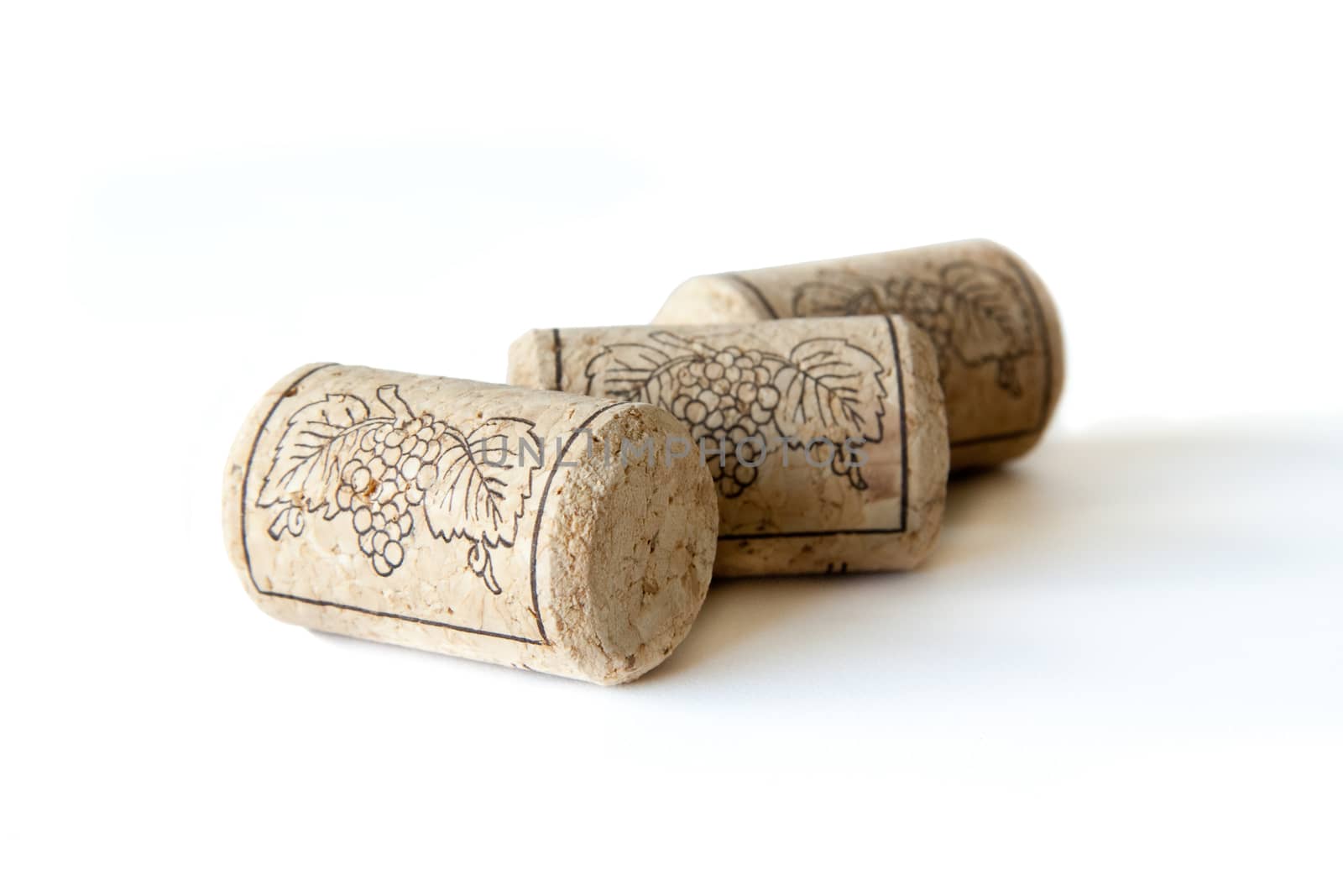 Wine corks on a white background