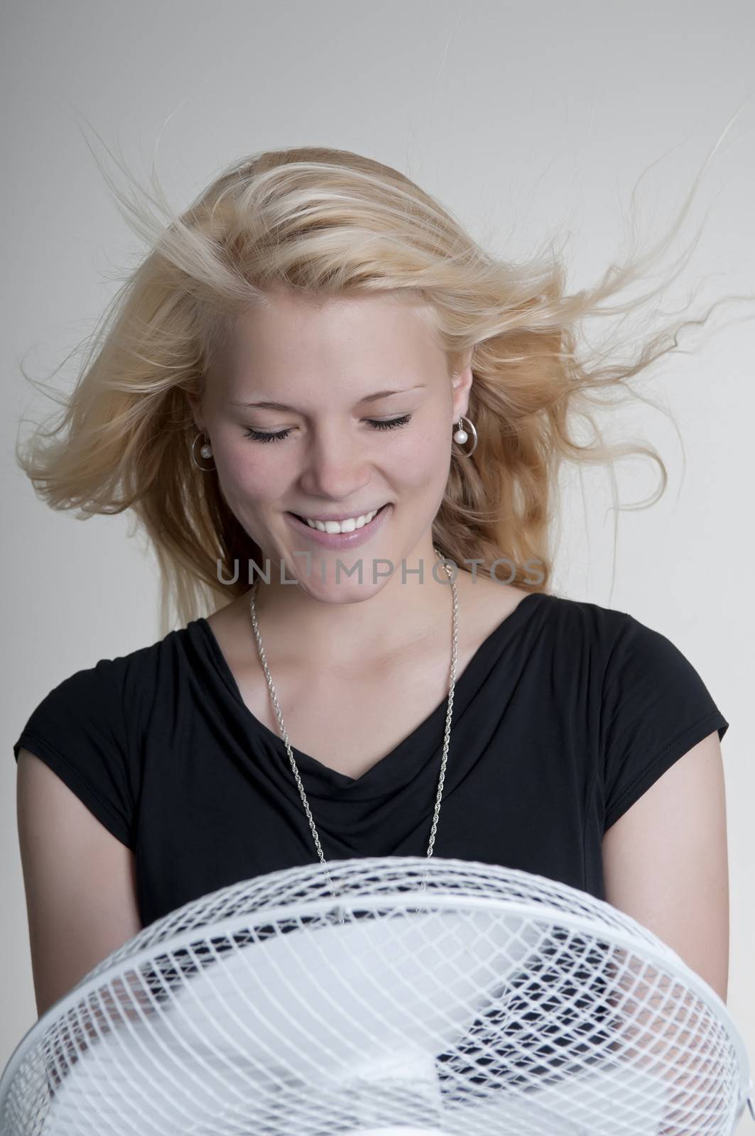happy young woman with fan