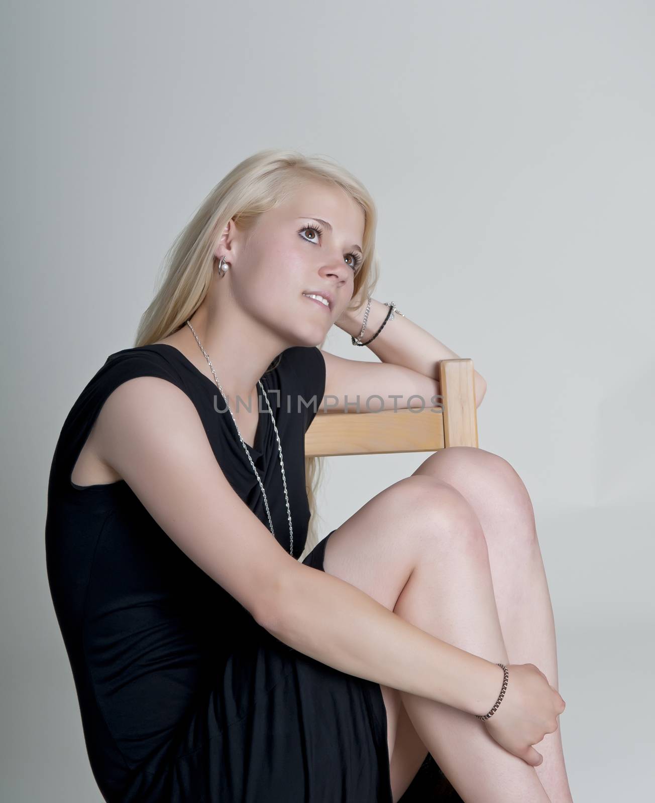 thoughtful young blond woman