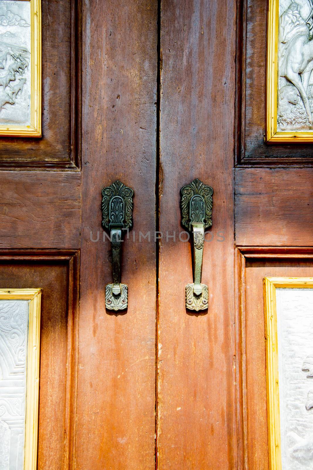 Door handle in church by gjeerawut