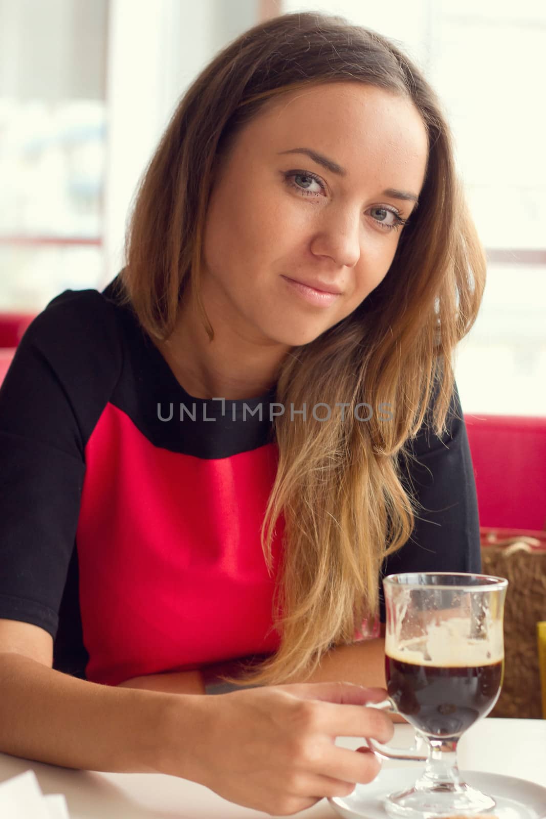 woman drinking coffee in the morning at restaurant