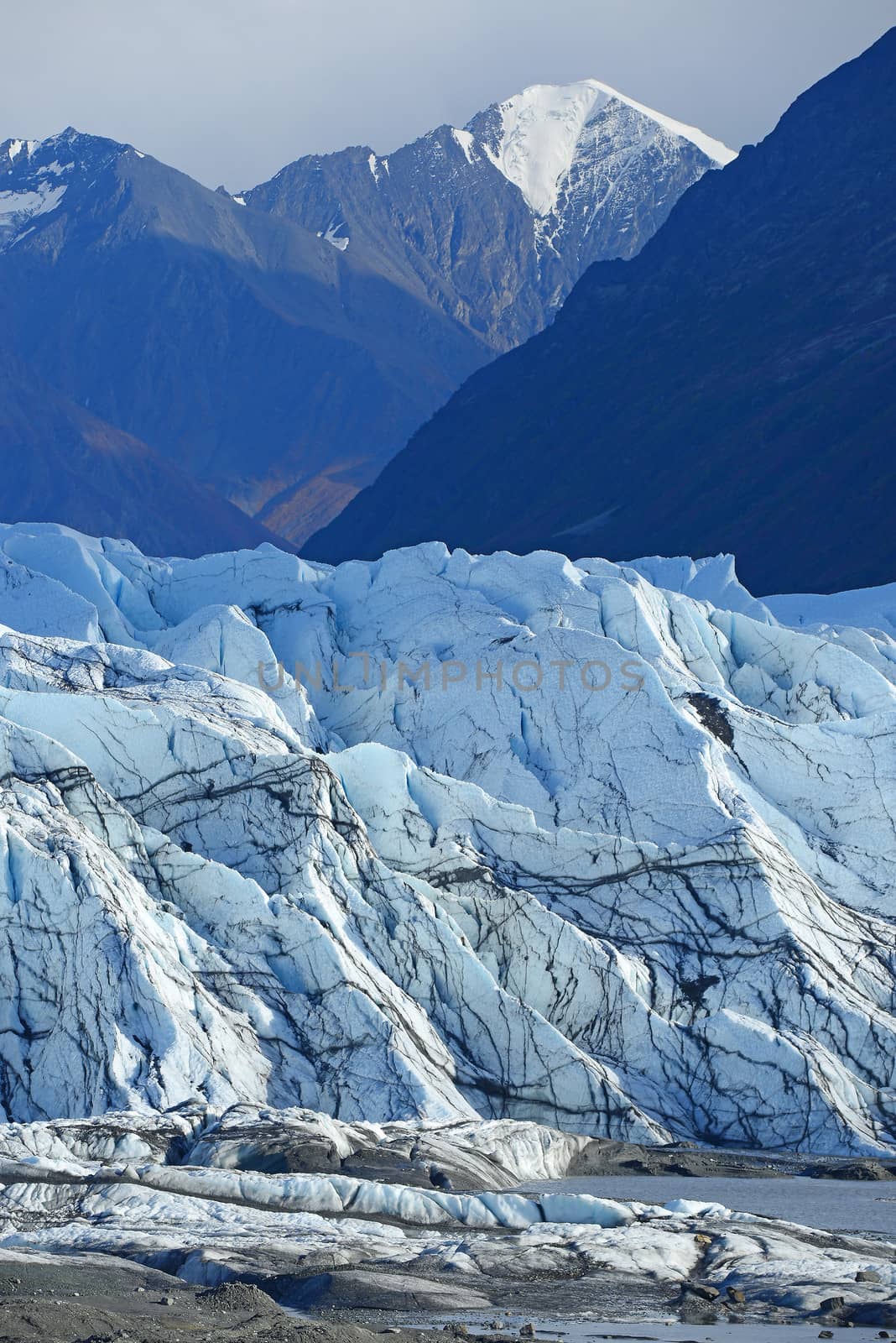 mountain with blue ice glacier in south alaska