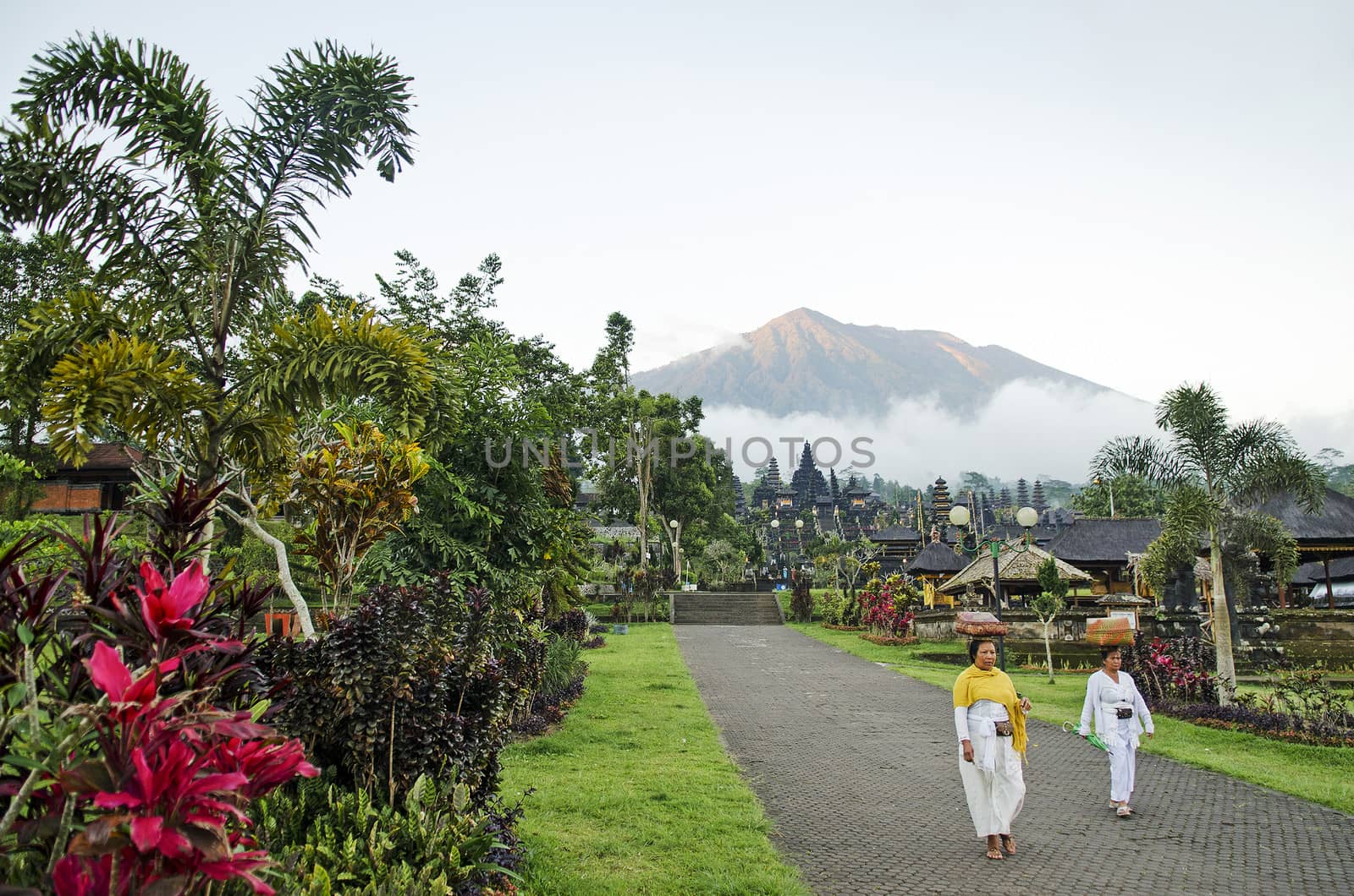 besakih temple and mount agung view in bali indonesia by jackmalipan