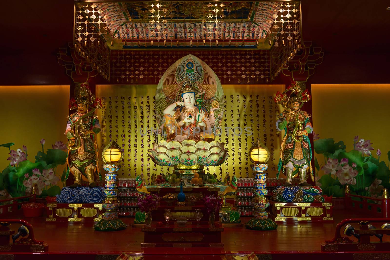 Buddha in Tooth Relic Temple in China Town, Singapore  by iryna_rasko