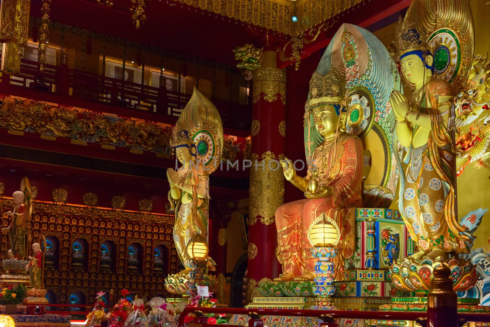 Buddha in Tooth Relic Temple interior in China Town, Singapore