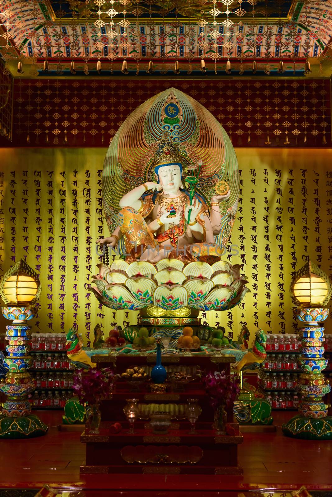 Buddha in Tooth Relic Temple in China Town, Singapore  by iryna_rasko