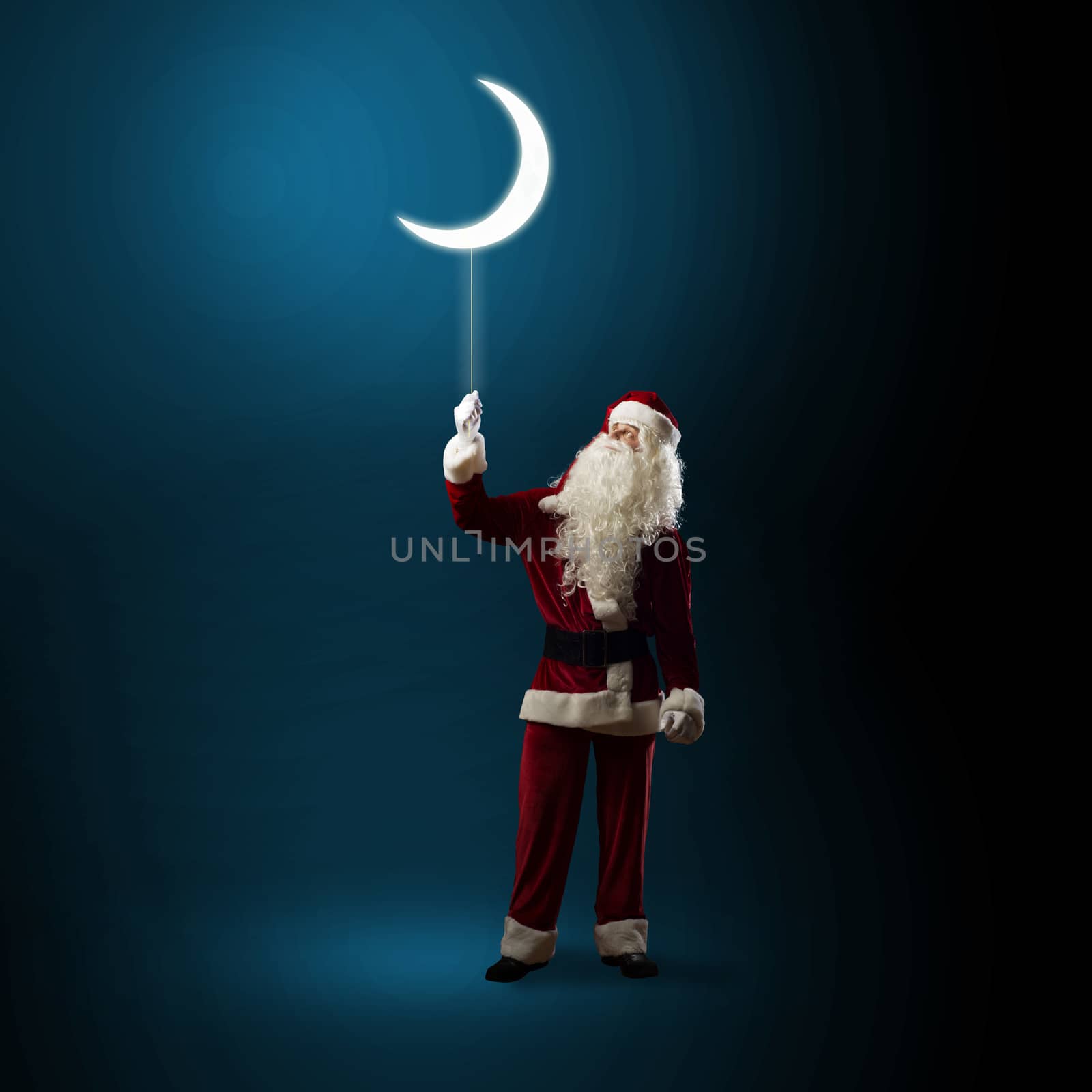 Santa Claus holding a shining moon by adam121