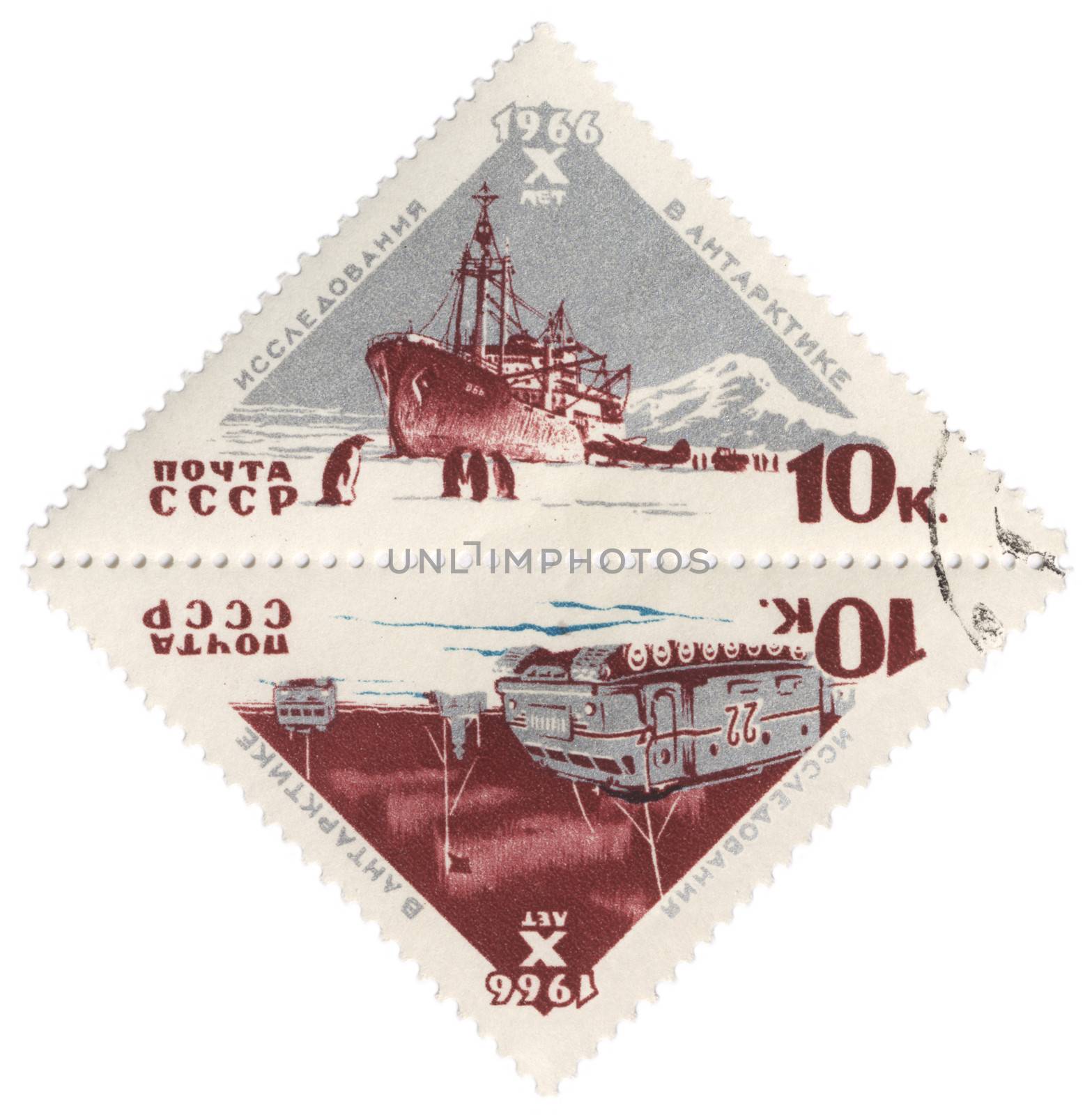 USSR - CIRCA 1966: A post stamp printed in USSR shows research vessel and all-terrain vehicle, dedicated to the 10th anniversary of Soviet research in Antarctica, circa 1966