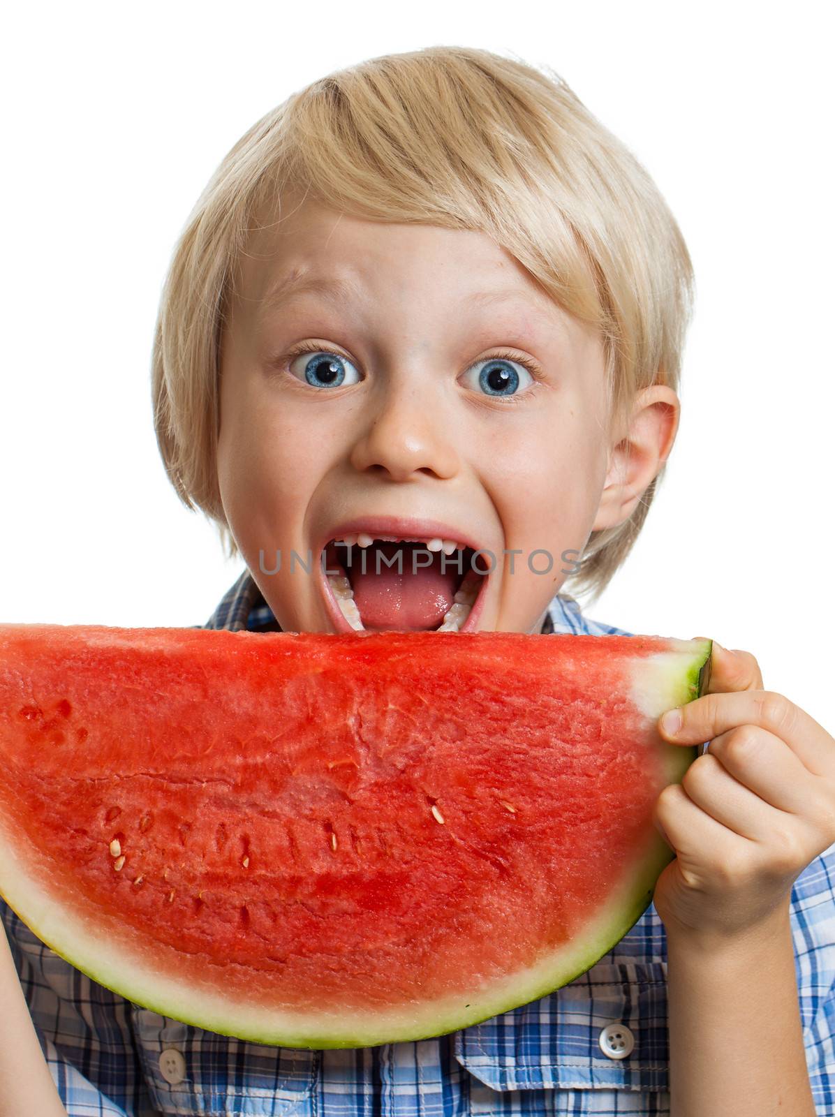 Close-up of boy taking bite of water melon by Jaykayl