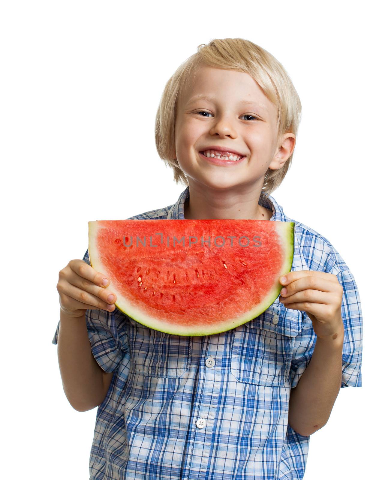 A cute happy blond boy holding a big juicy slice of watermelon. Isolated on white.