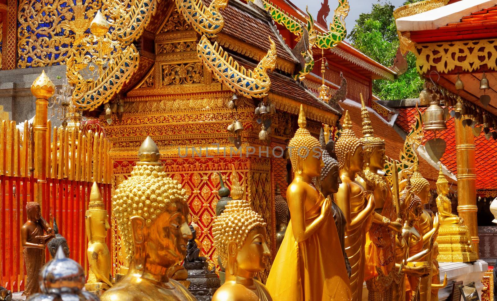 Gold face of Buddha statue in Doi Suthep temple, Chiang Mai, Thailand. 