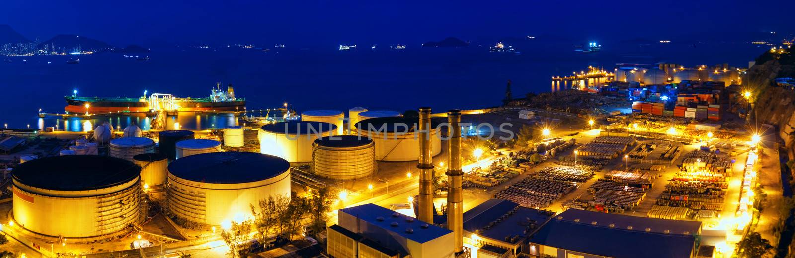 Oil tanks at night , hongkong  by cozyta