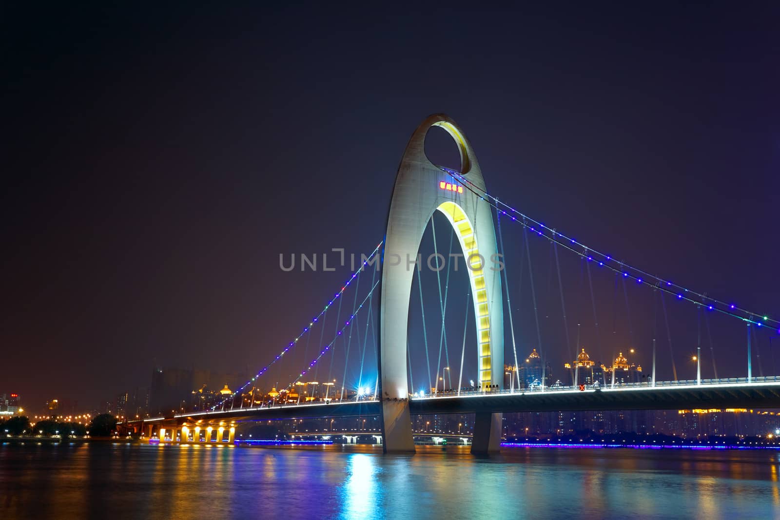 Night scene of Liede bridge with brilliant spot light in Guangzhou city of China 