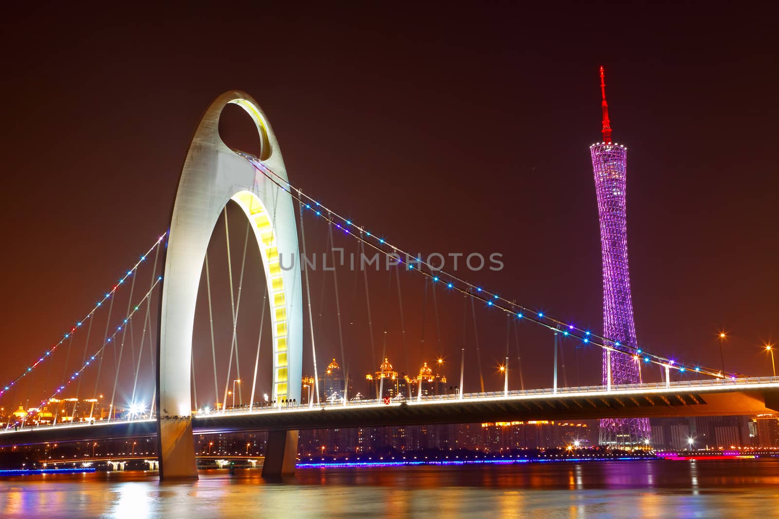 Zhujiang River and modern building of financial district at night in guangzhou china. 