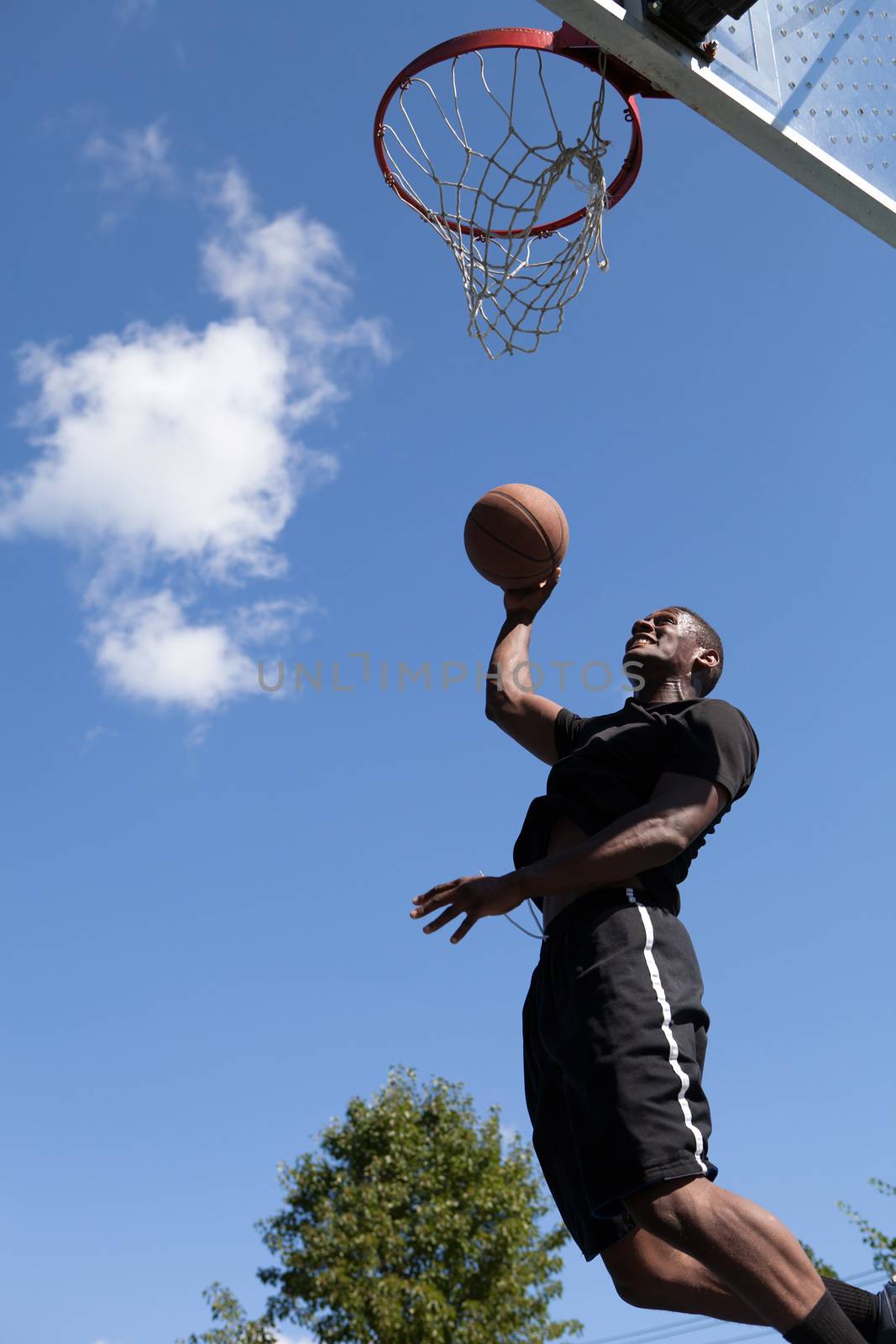 Man Dunking a Basketball by graficallyminded
