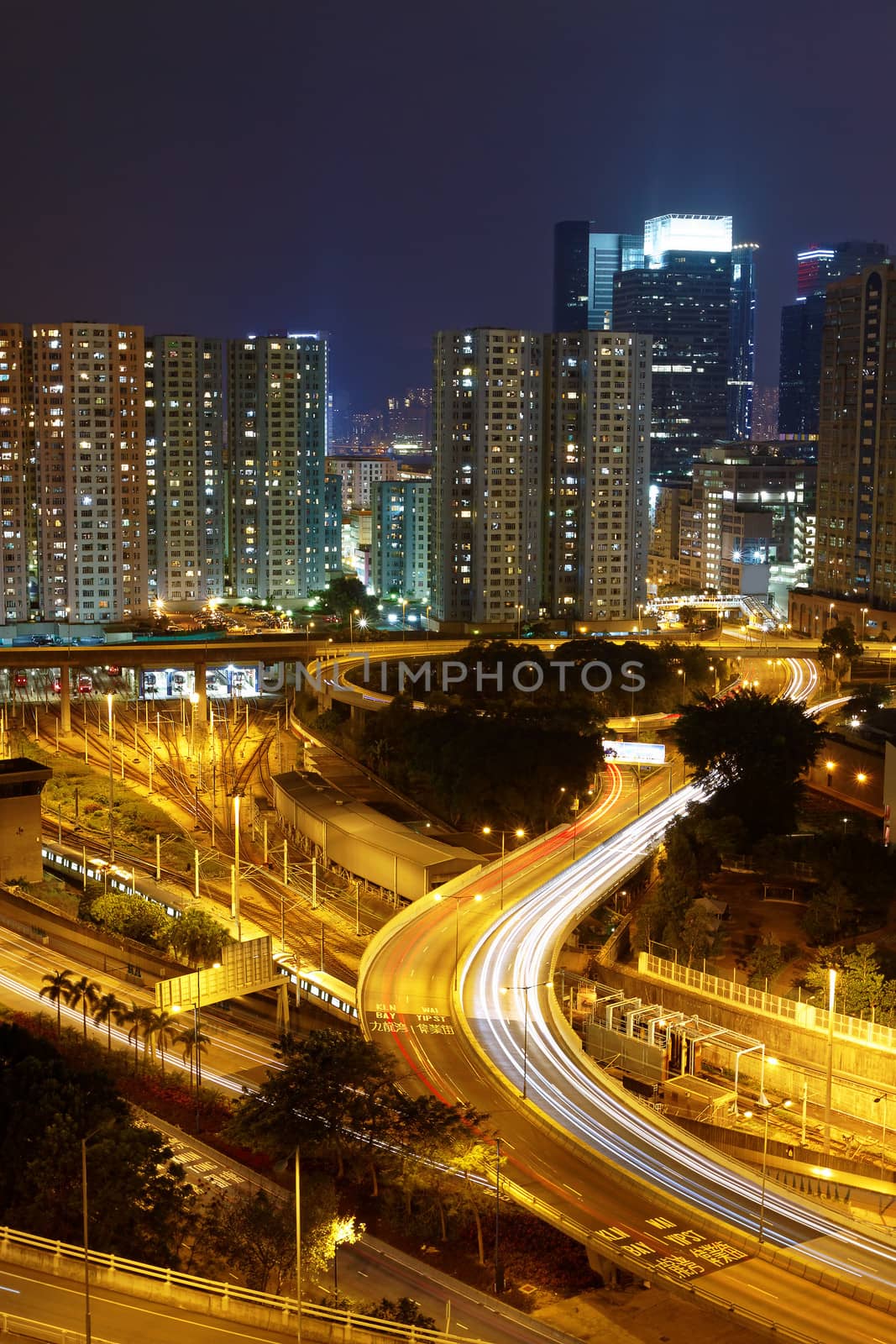 highway and traffic at night, hongkong by cozyta