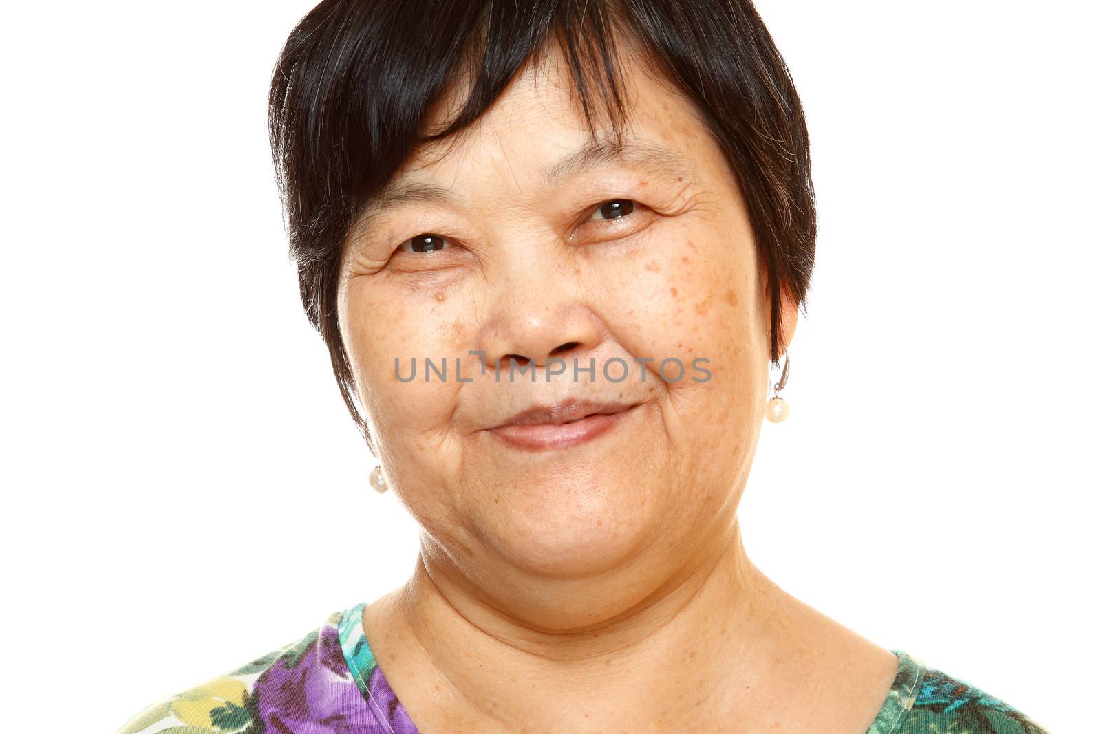 Happy 60s Senior Asian Woman on white background  by cozyta