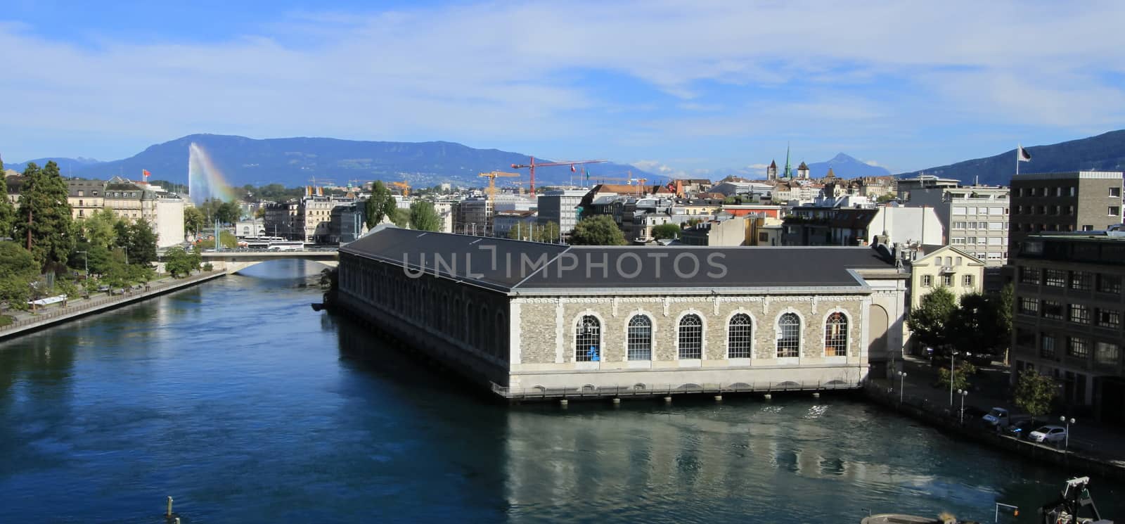 Rhone river, Batiment des Forces Motrices and fountain at Geneva, Switzerland