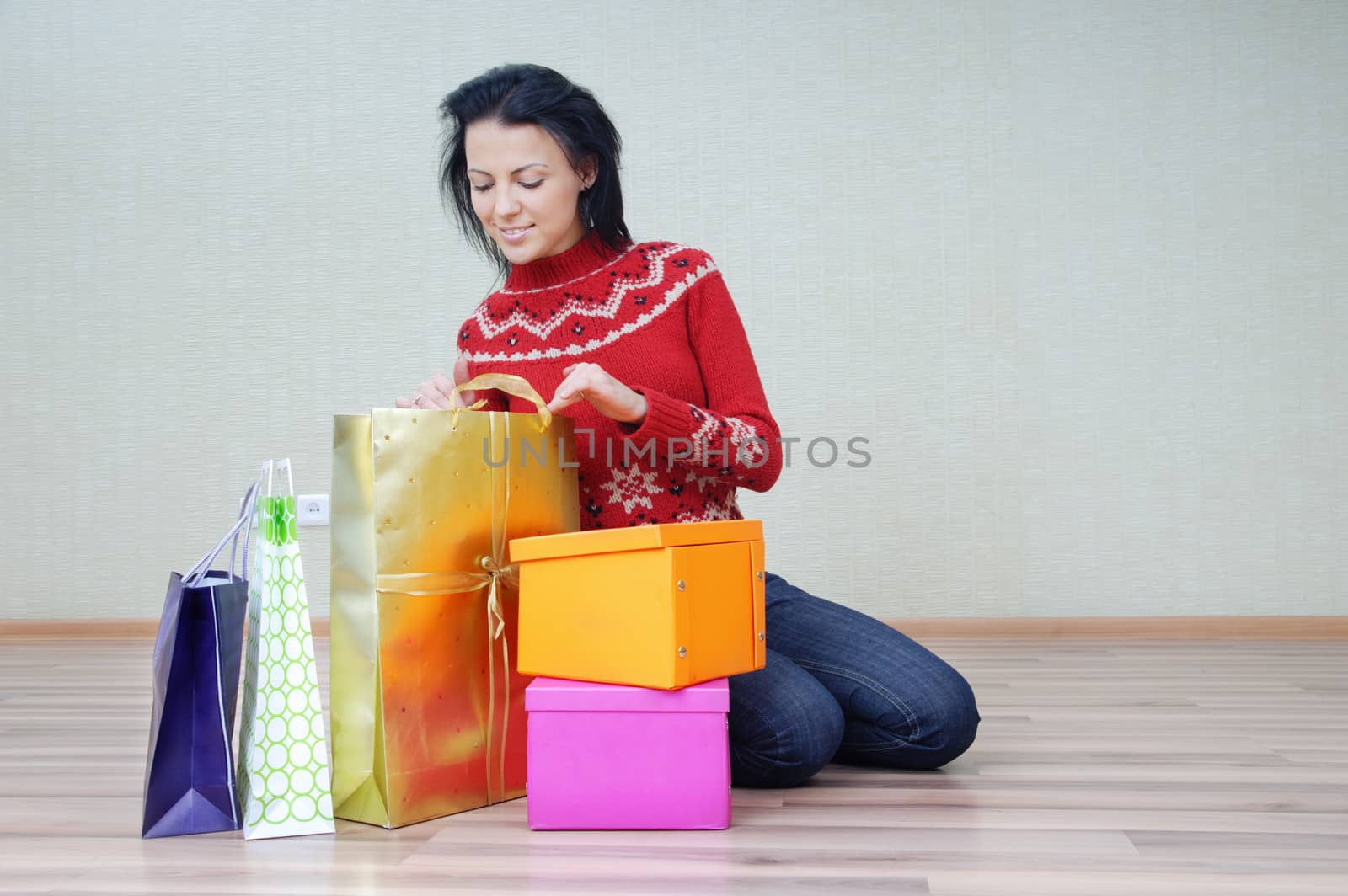 Woman and packages with procured gifts and presents