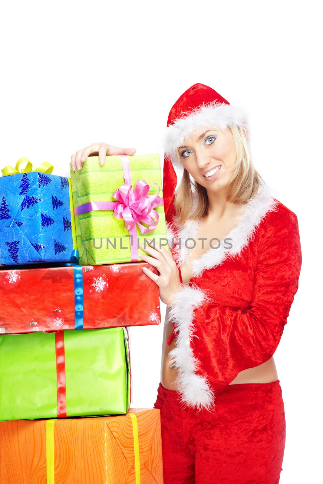 Smiling lady in Santa costume holding Christmas gifts on a white background