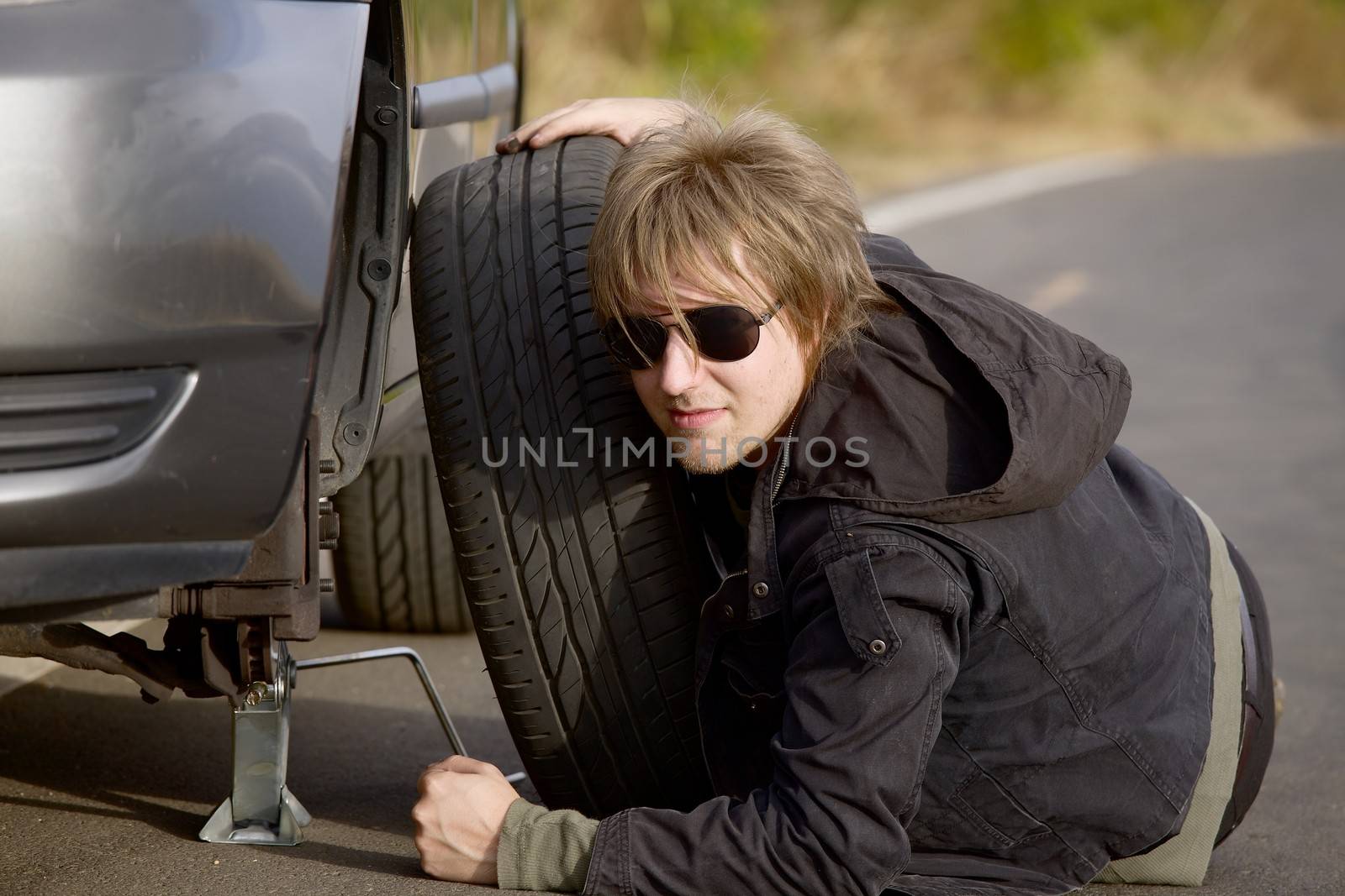 Changing wheels on a car