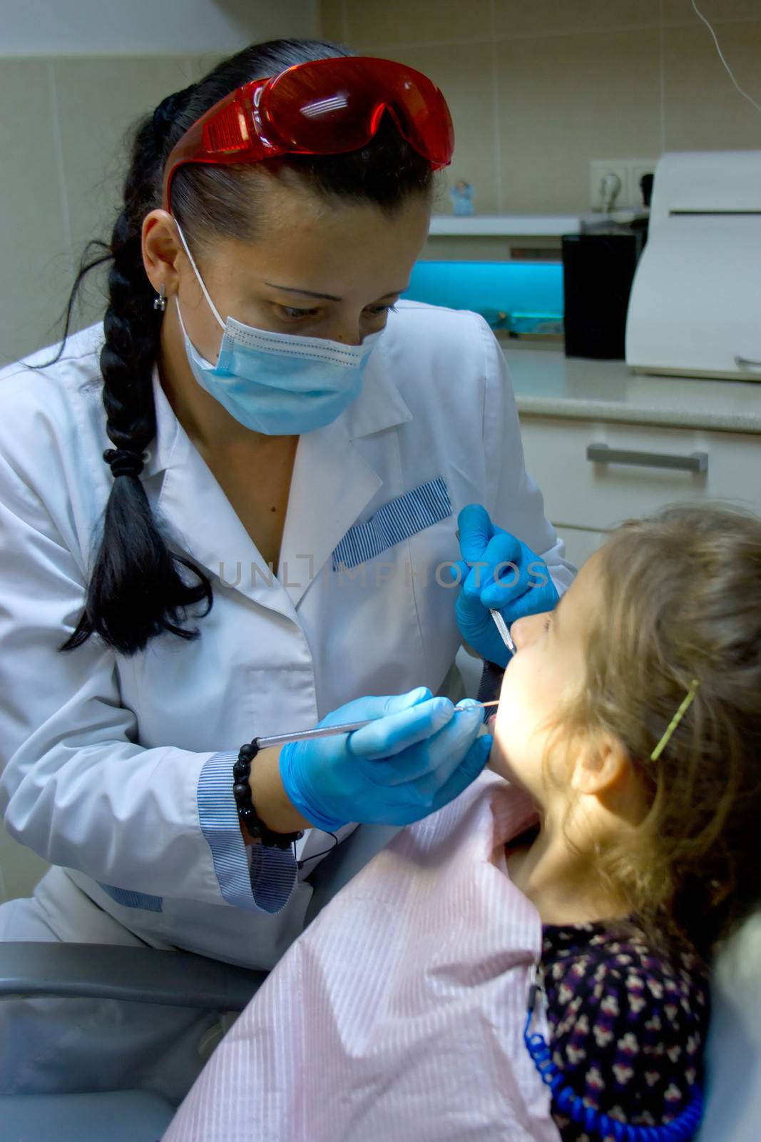 a girl at the dentist.